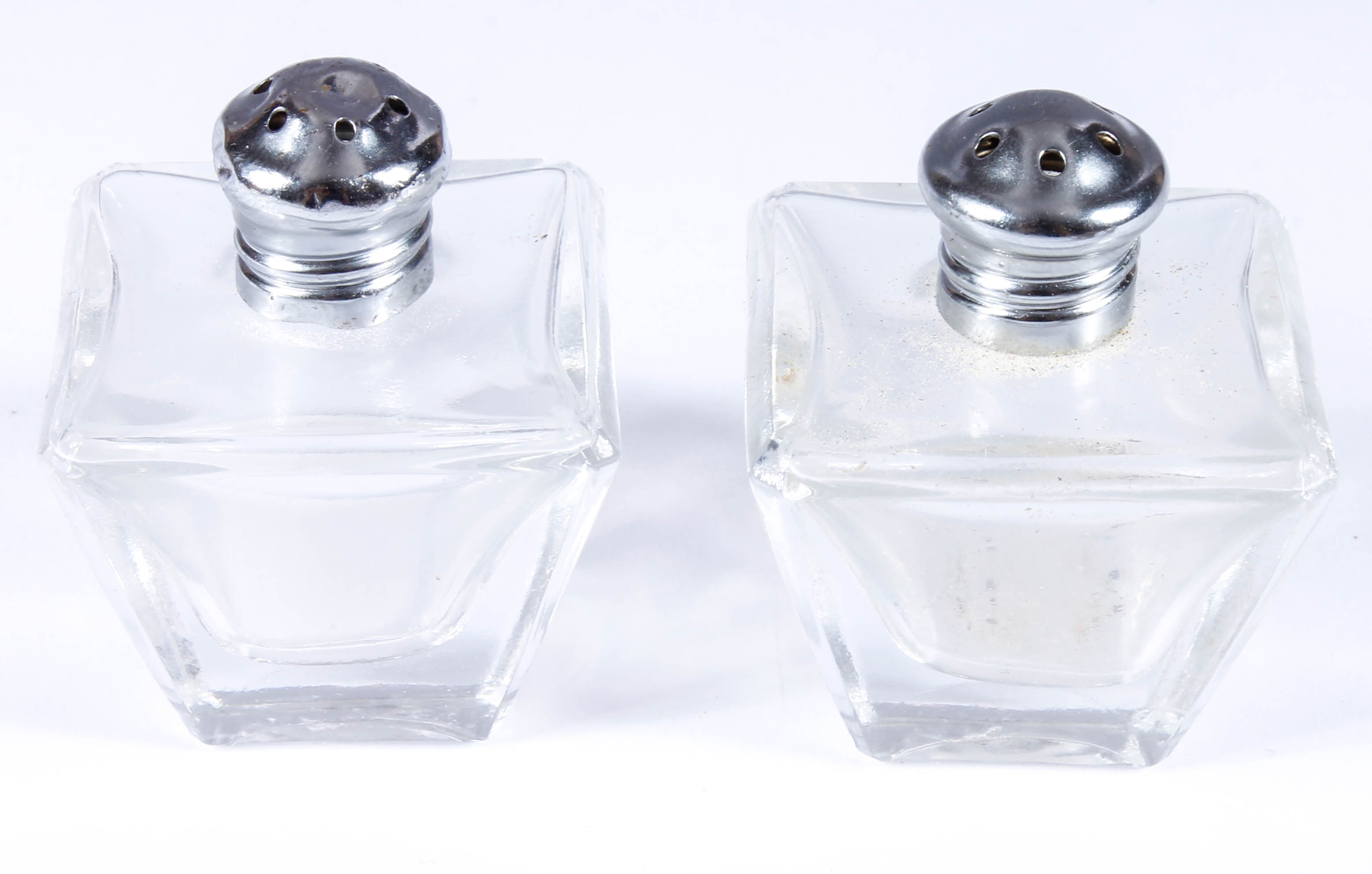 Assortment of Salt and Pepper Shakers with Salt Cellars