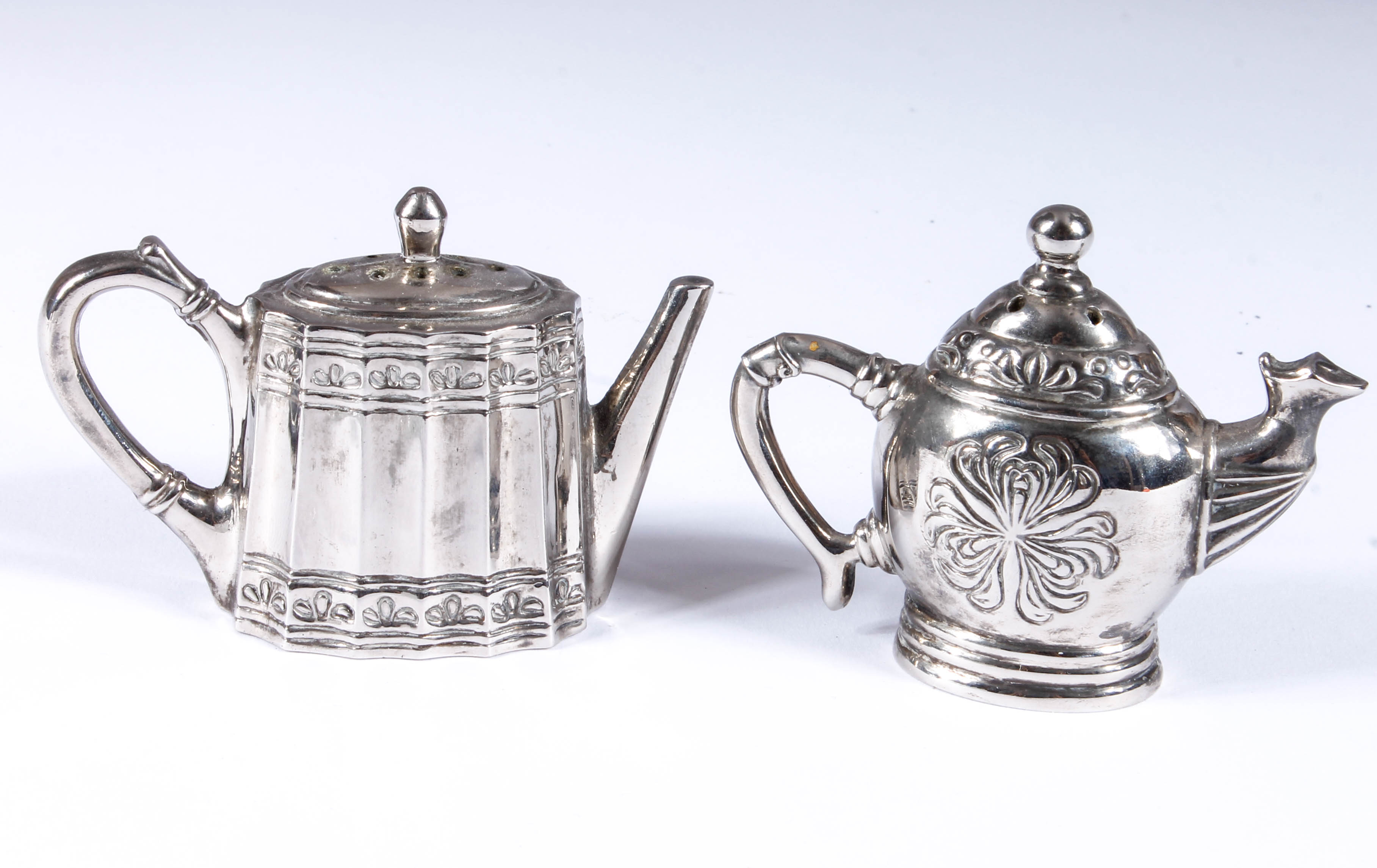 Assortment of Salt and Pepper Shakers with Salt Cellars