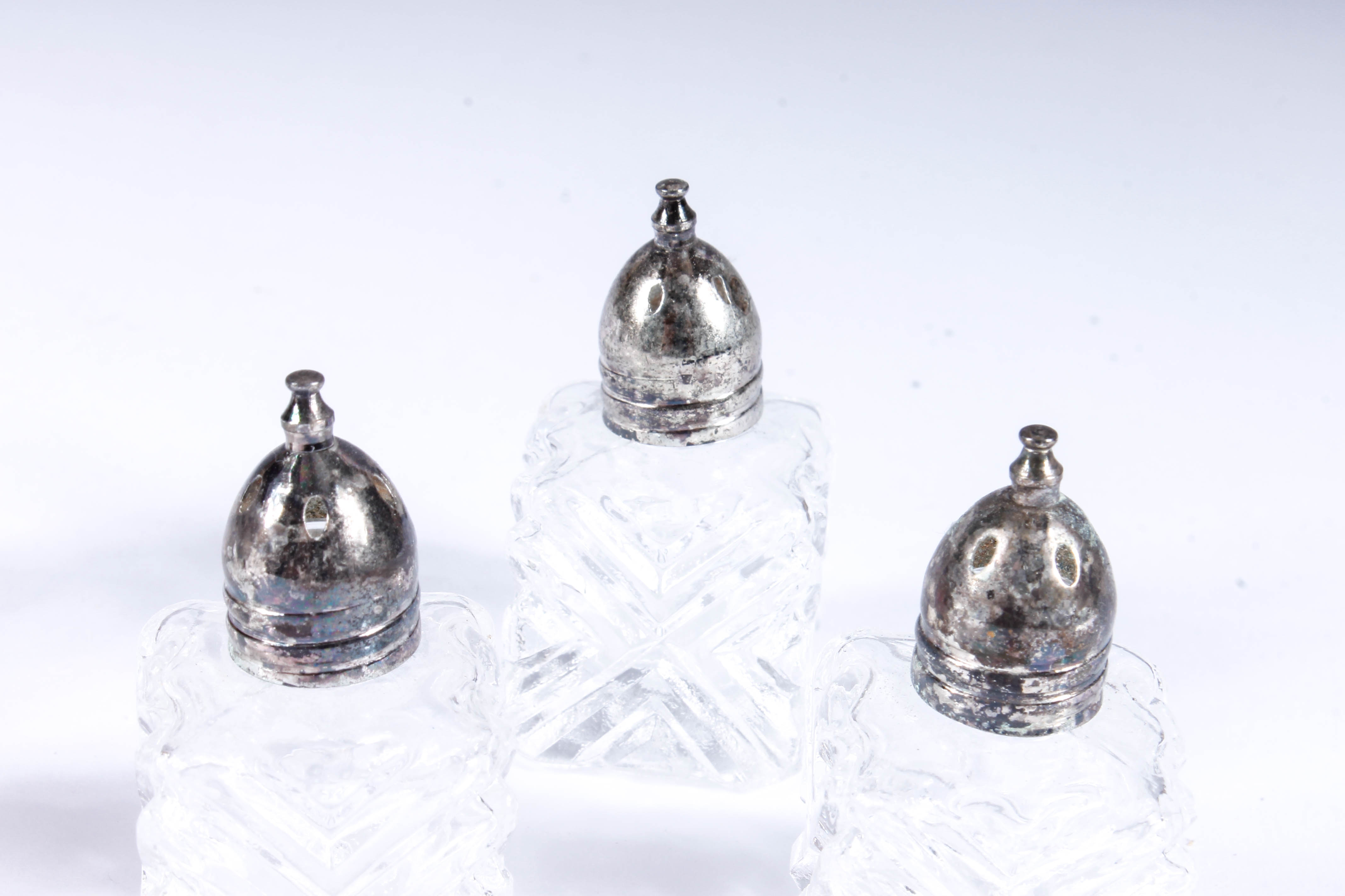 Assortment of Salt and Pepper Shakers with Salt Cellars
