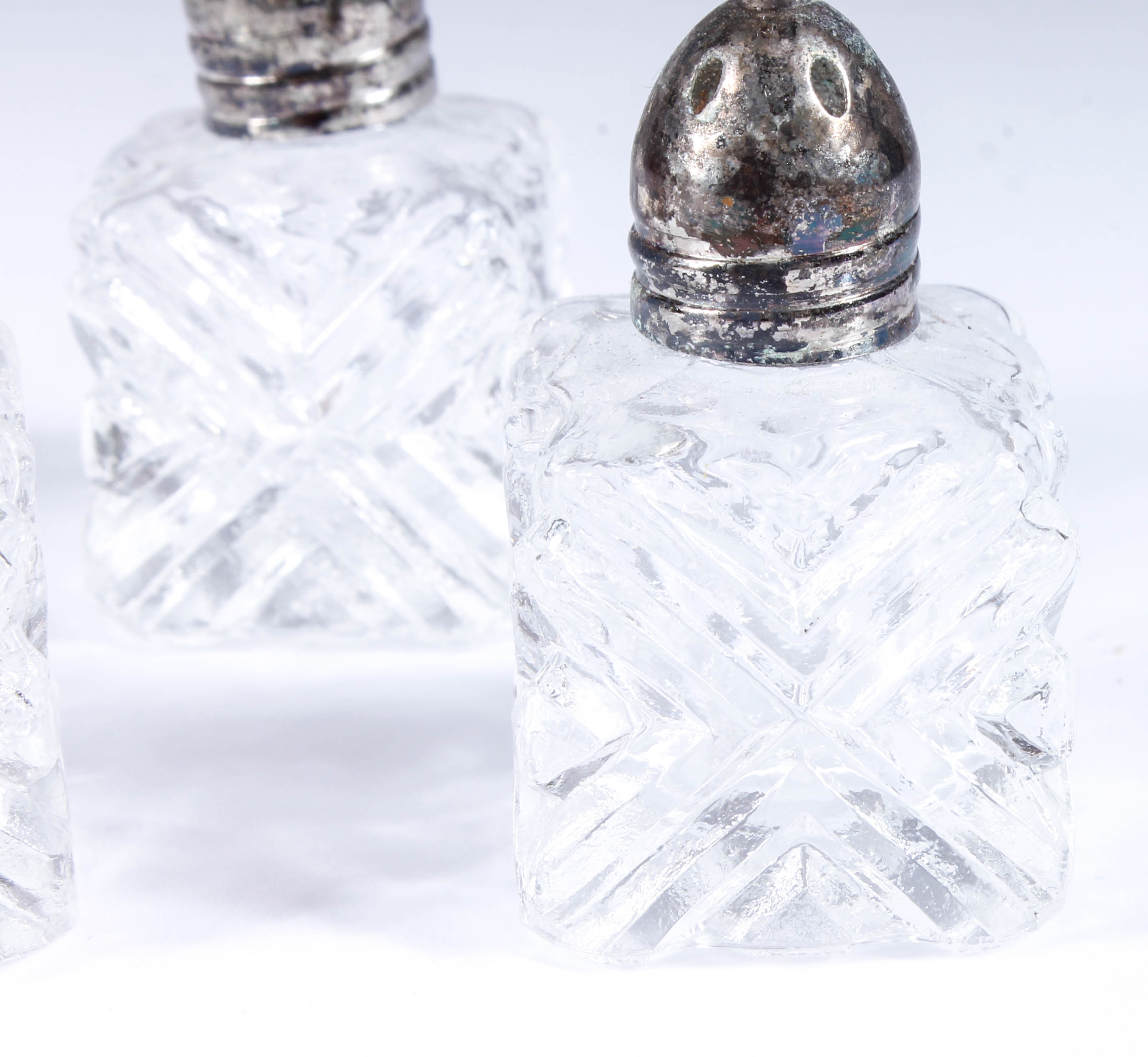 Assortment of Salt and Pepper Shakers with Salt Cellars