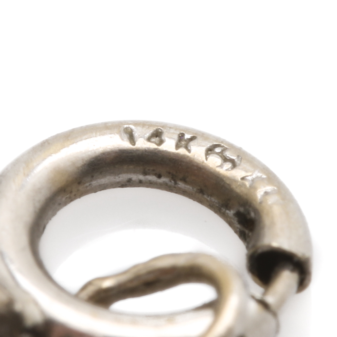 18K White Gold Diamond, Pink Sapphire, and Ruby Pendant With 14K White Gold Chai