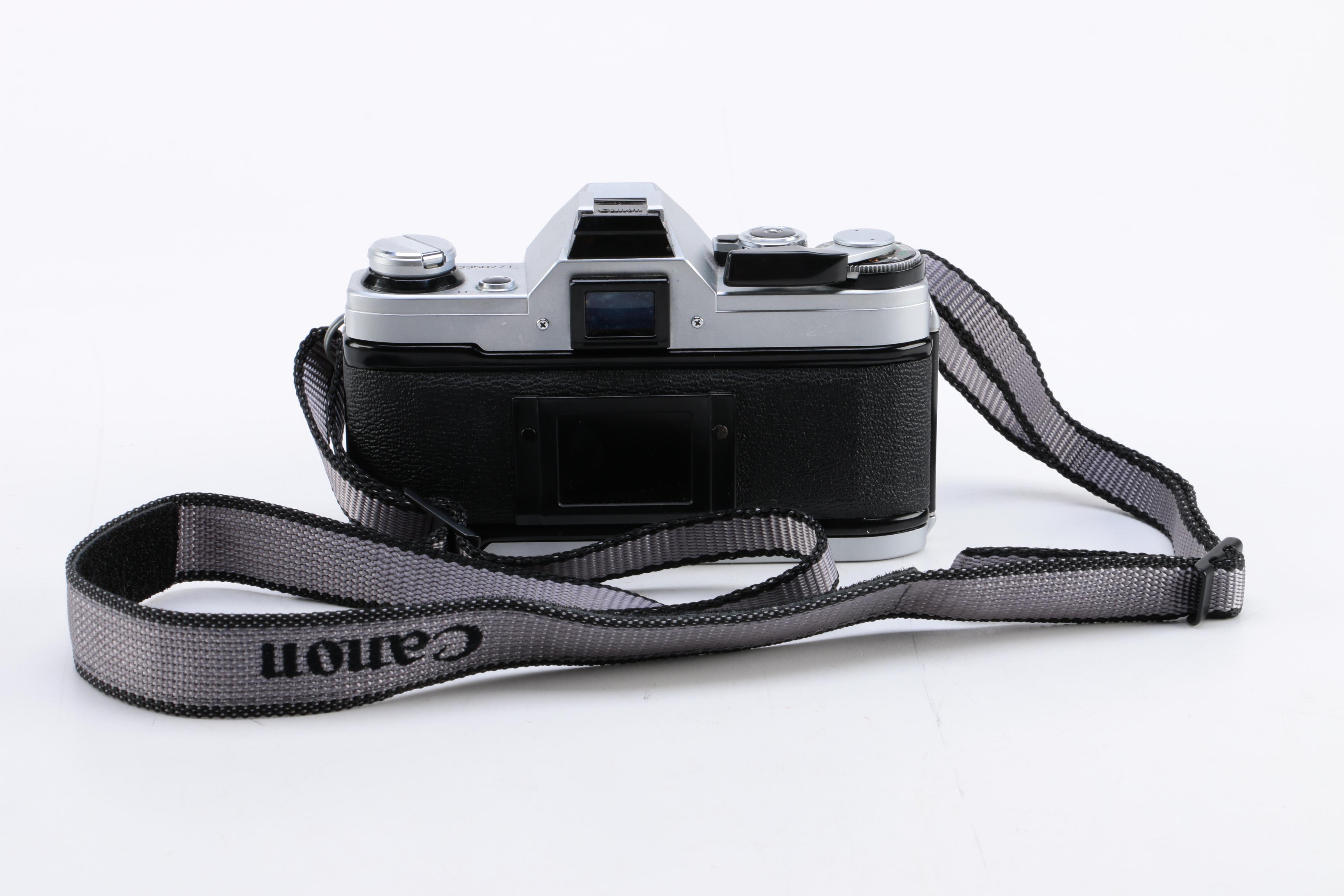 Canon AE-1 Camera with Vintage Eastman Kodak Photography Book