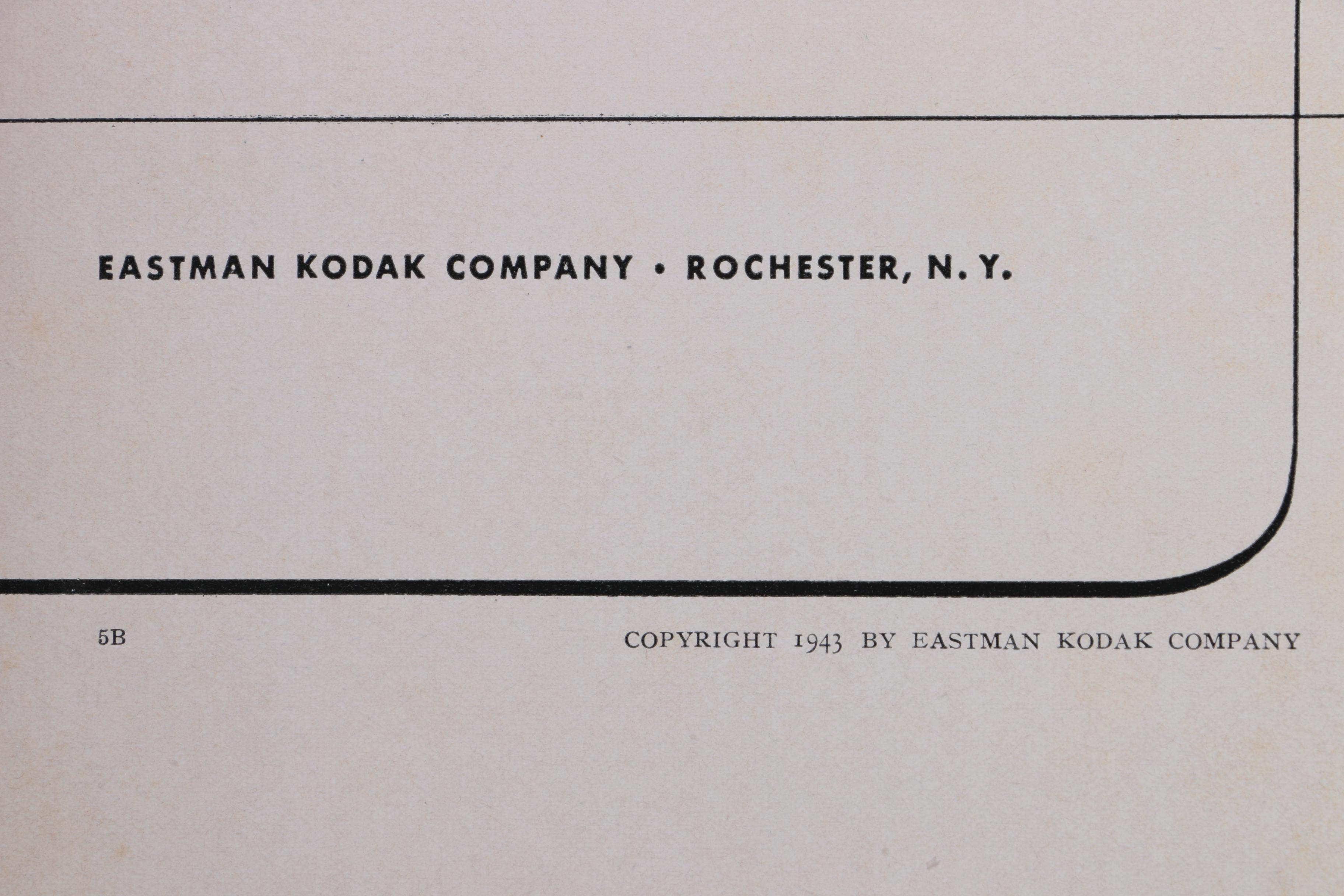 Canon AE-1 Camera with Vintage Eastman Kodak Photography Book