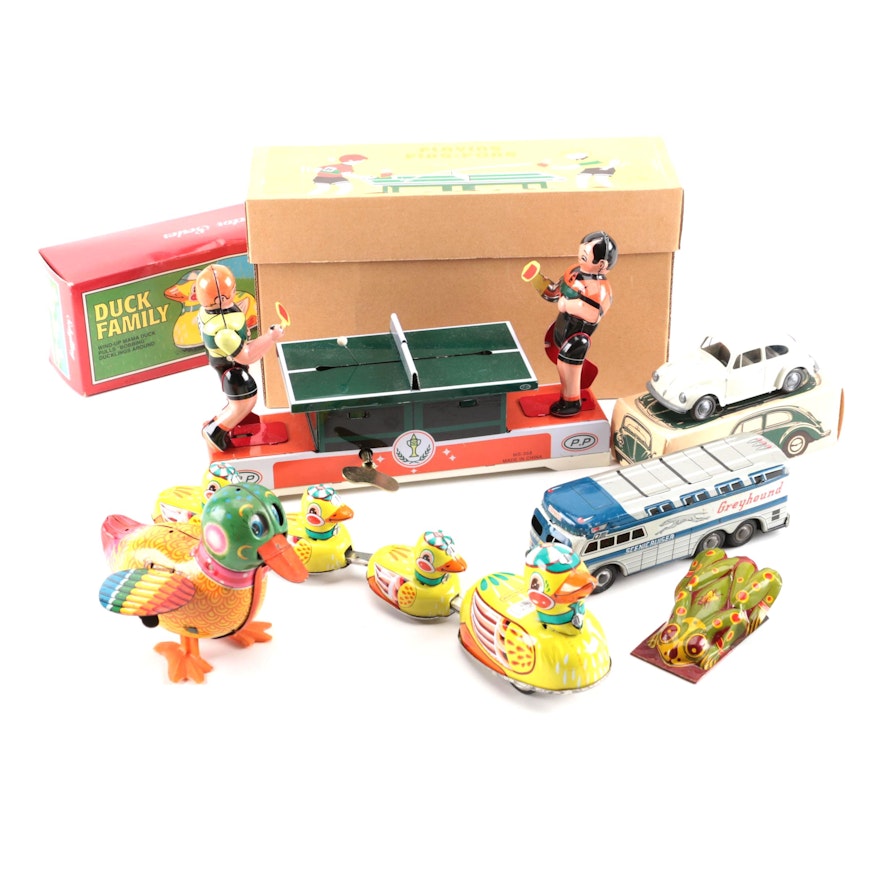 Assorted Wind-Up Toys and Die Cast Vehicles