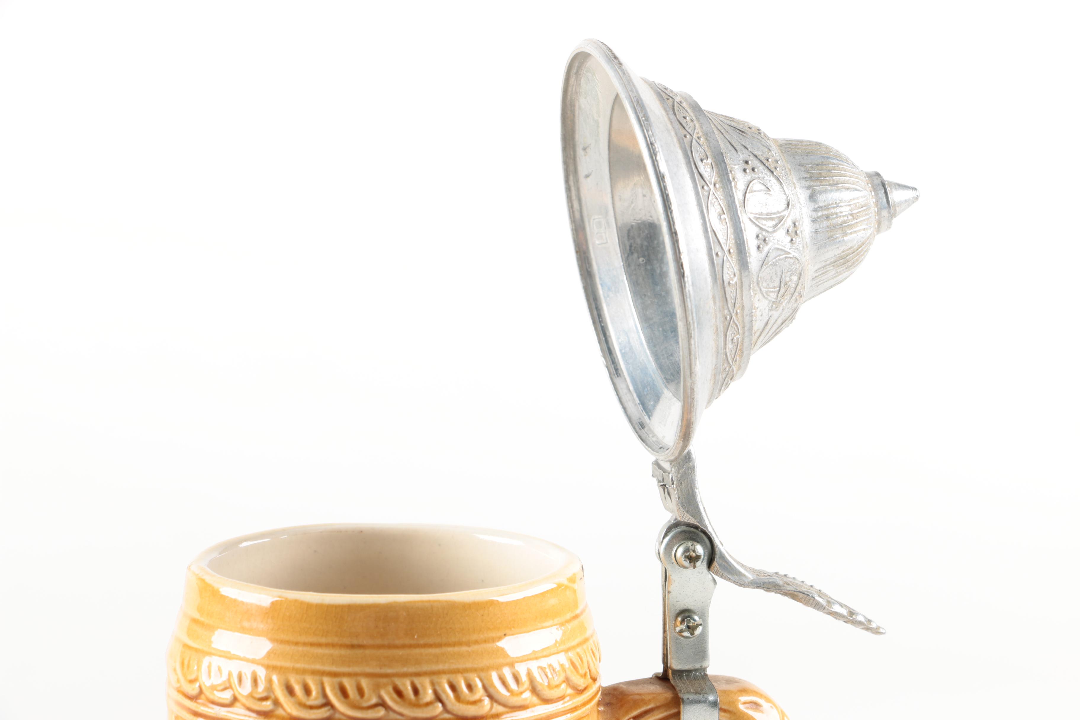 Four Ceramic Beer Steins