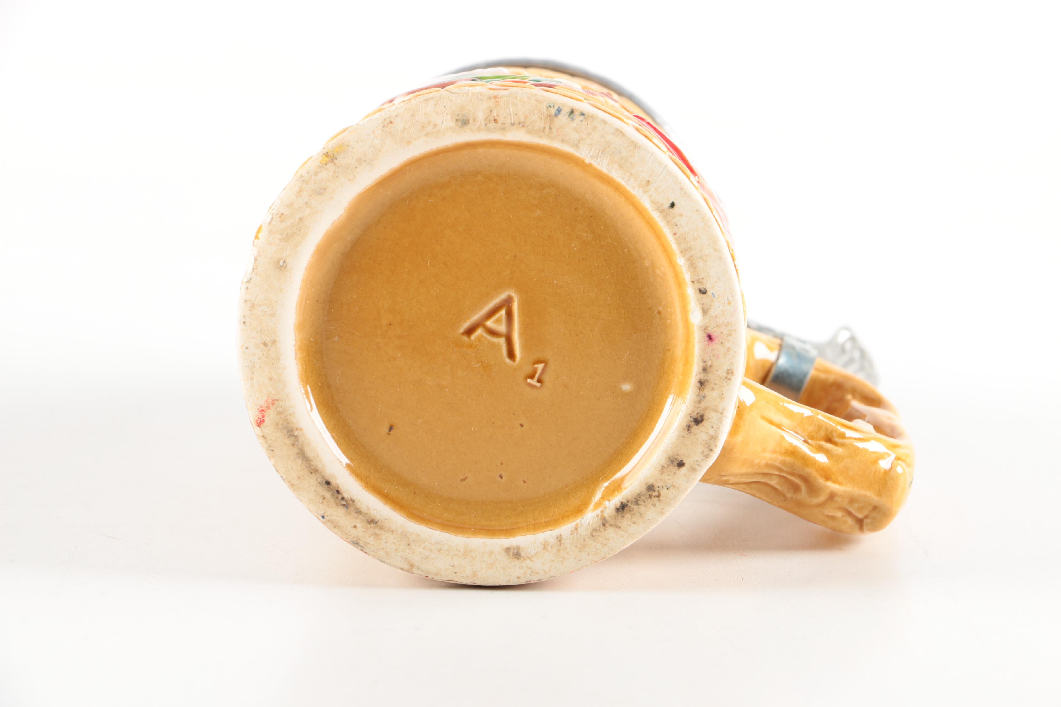 Four Ceramic Beer Steins