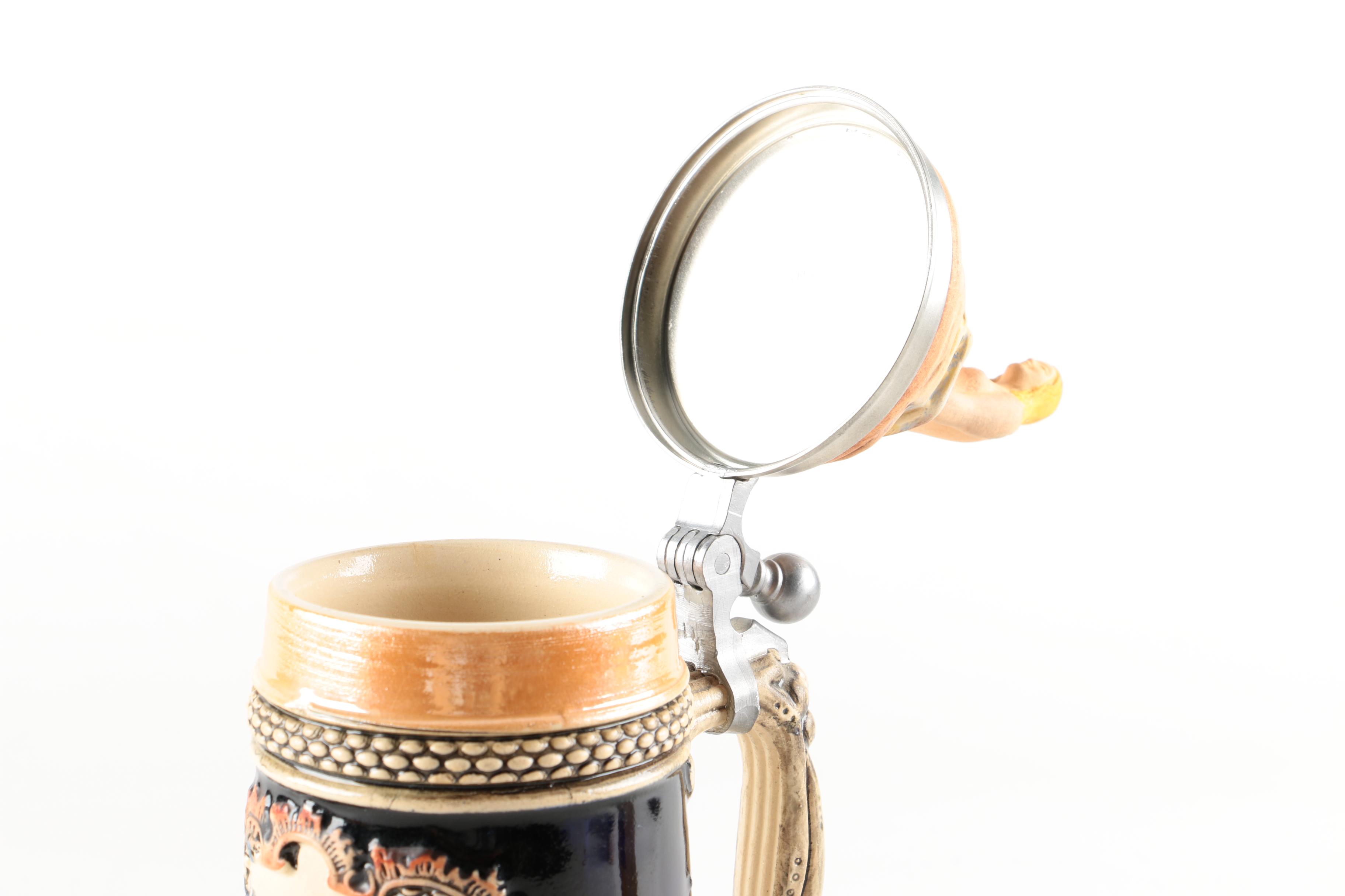 Four Ceramic Beer Steins