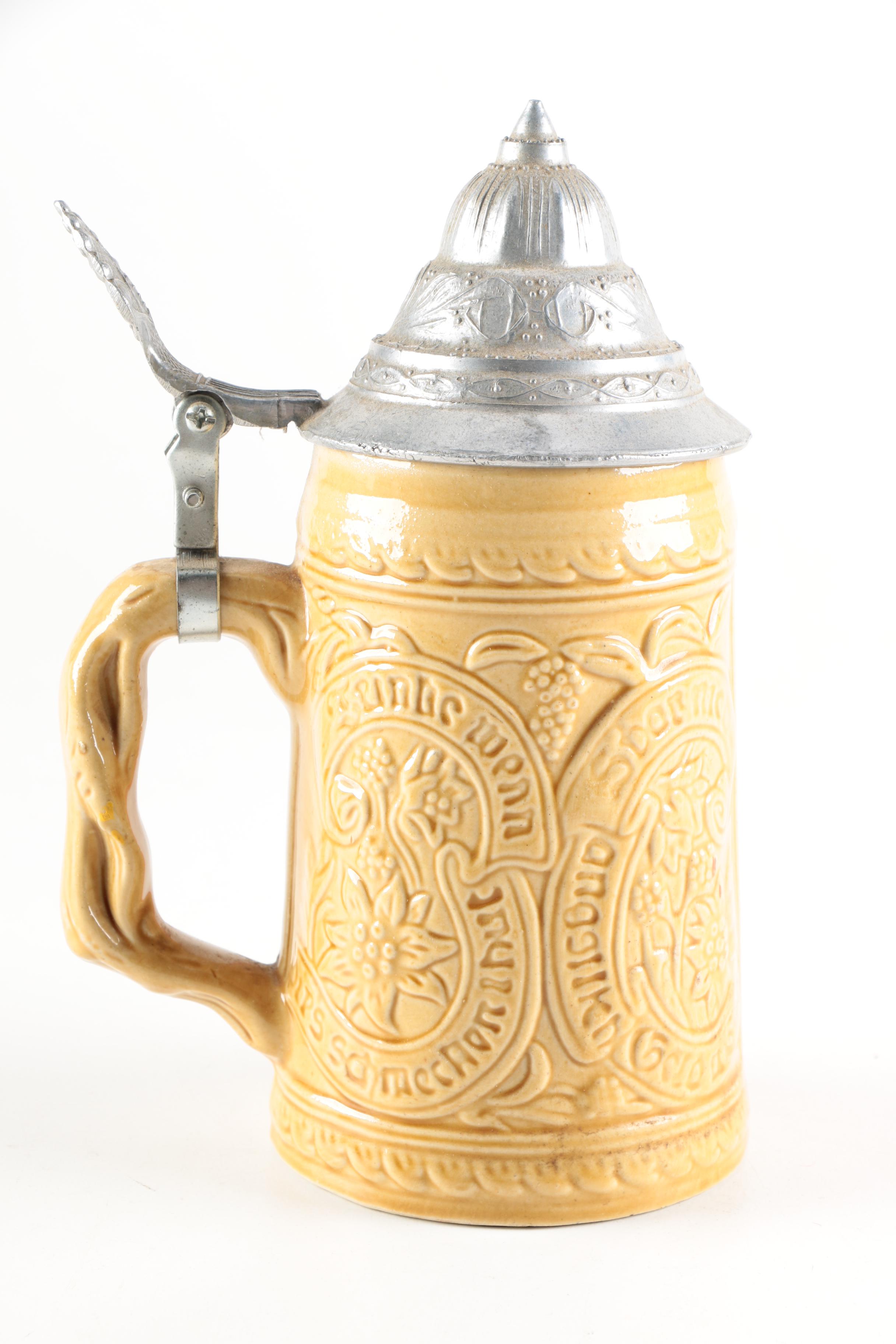 Four Ceramic Beer Steins