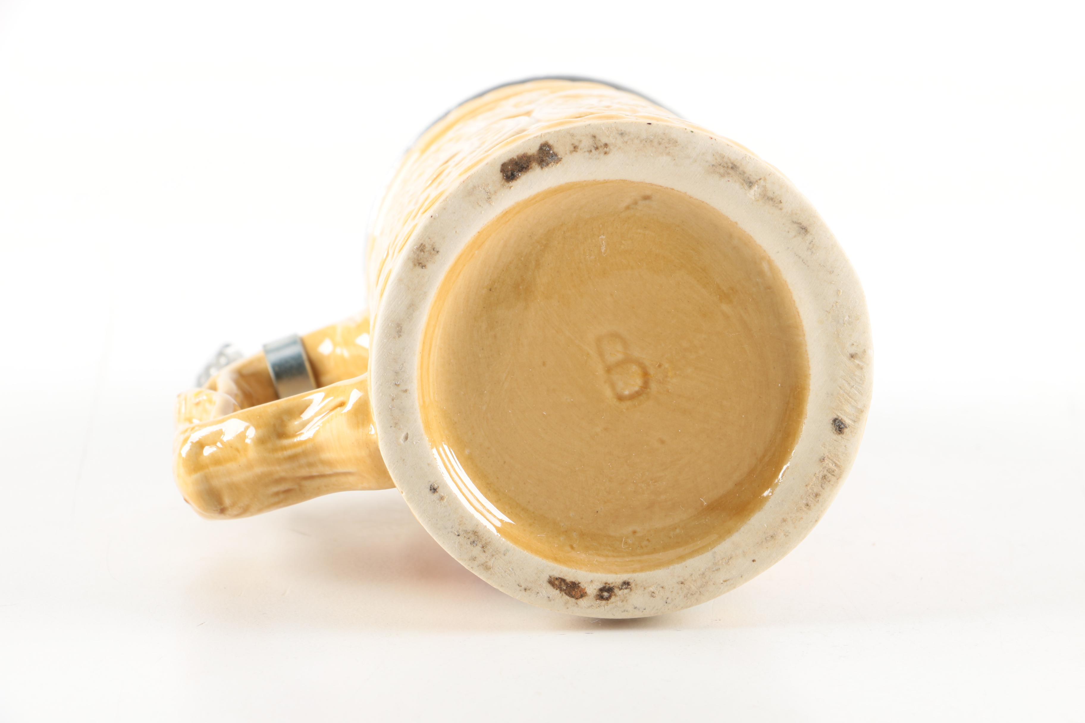 Four Ceramic Beer Steins