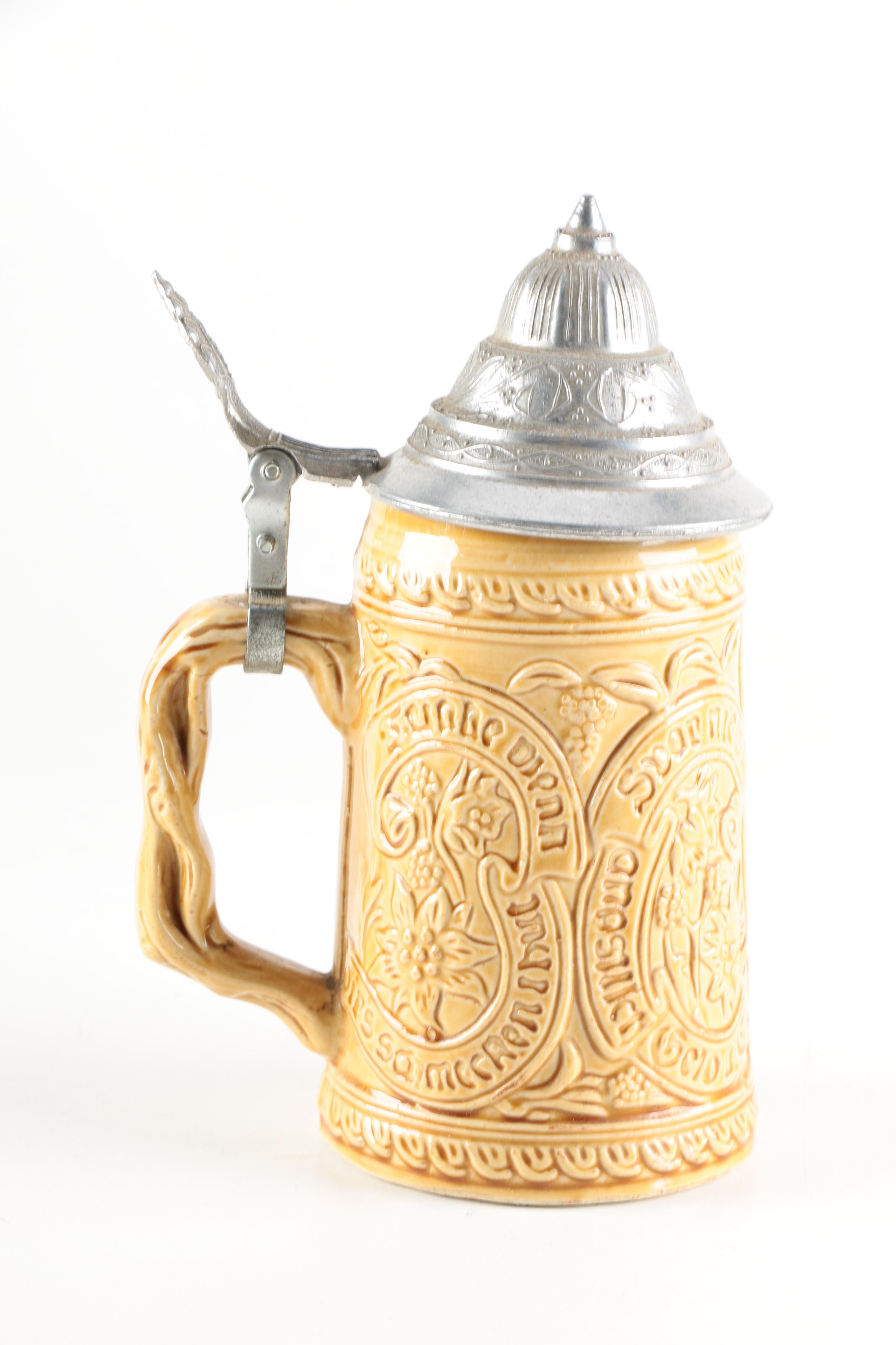 Four Ceramic Beer Steins