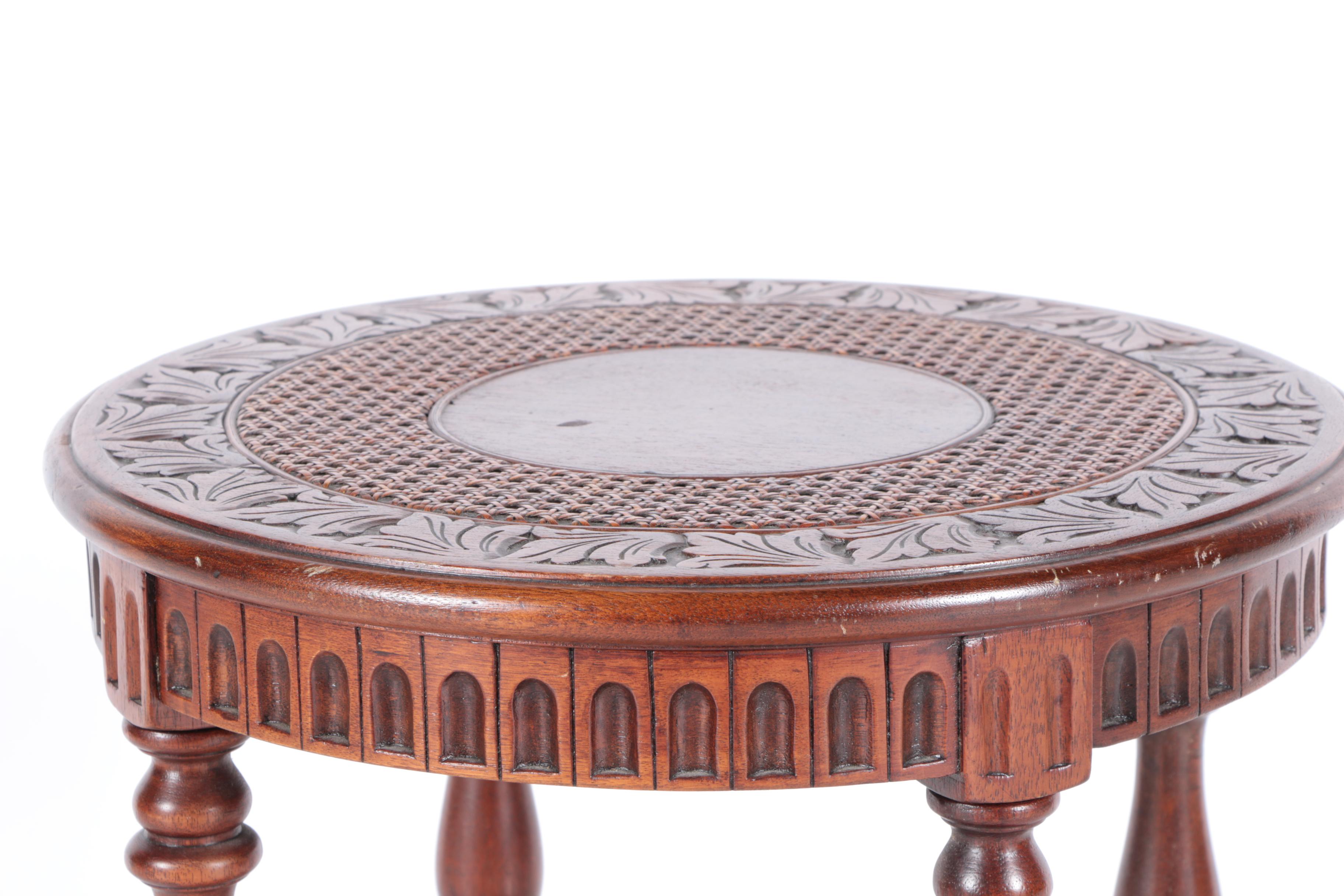 Vintage Asian Inspired Carved Hardwood Side Table with Caned Top