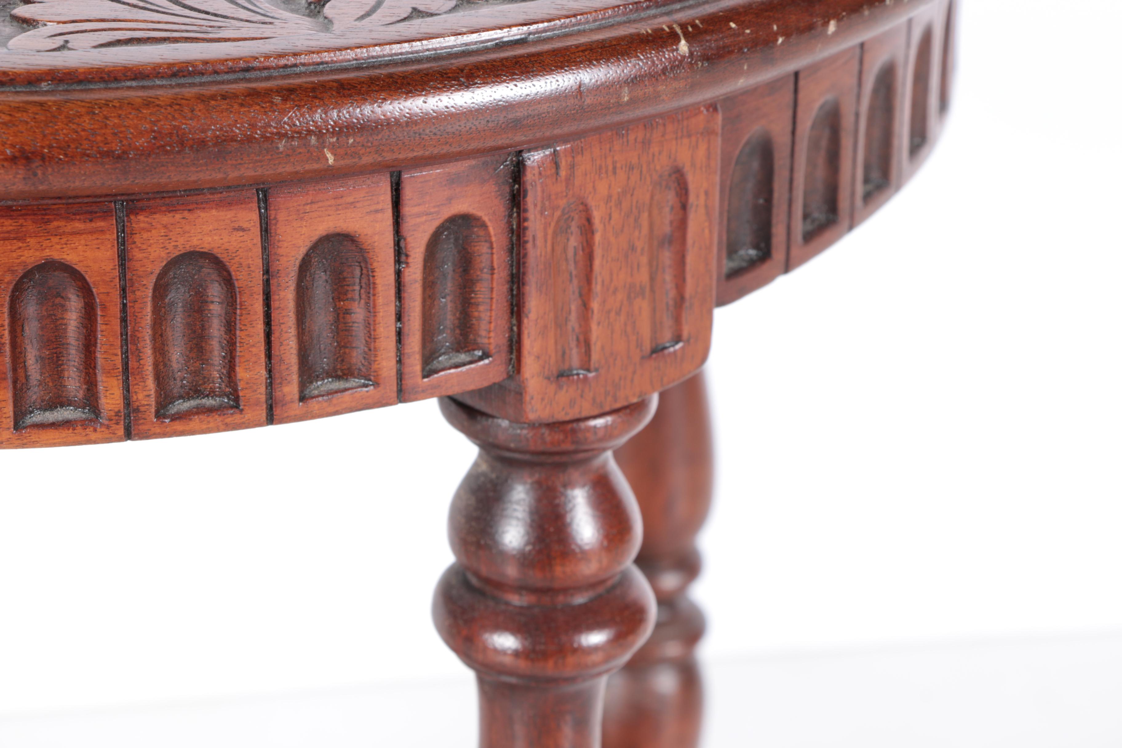 Vintage Asian Inspired Carved Hardwood Side Table with Caned Top