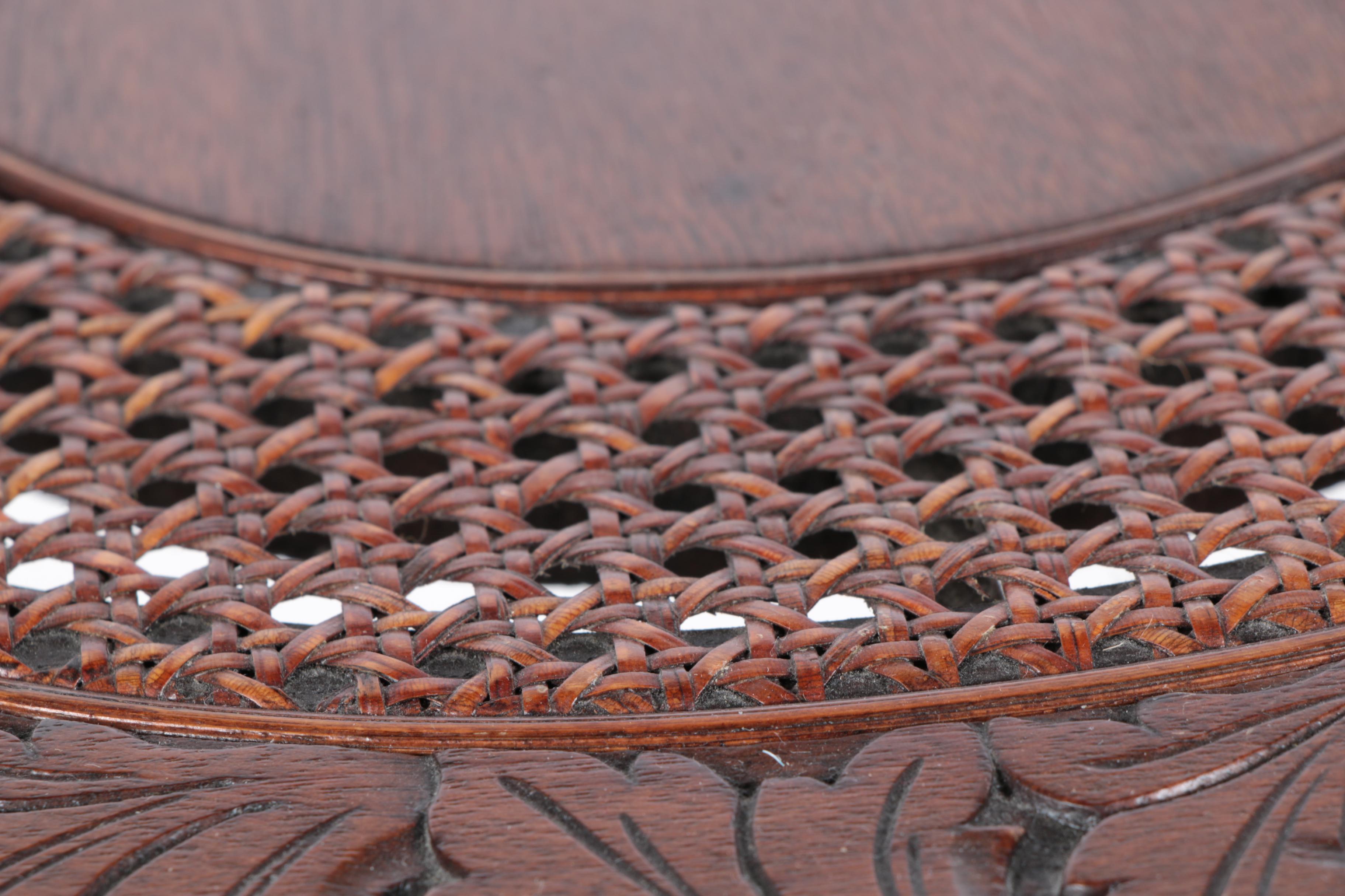 Vintage Asian Inspired Carved Hardwood Side Table with Caned Top