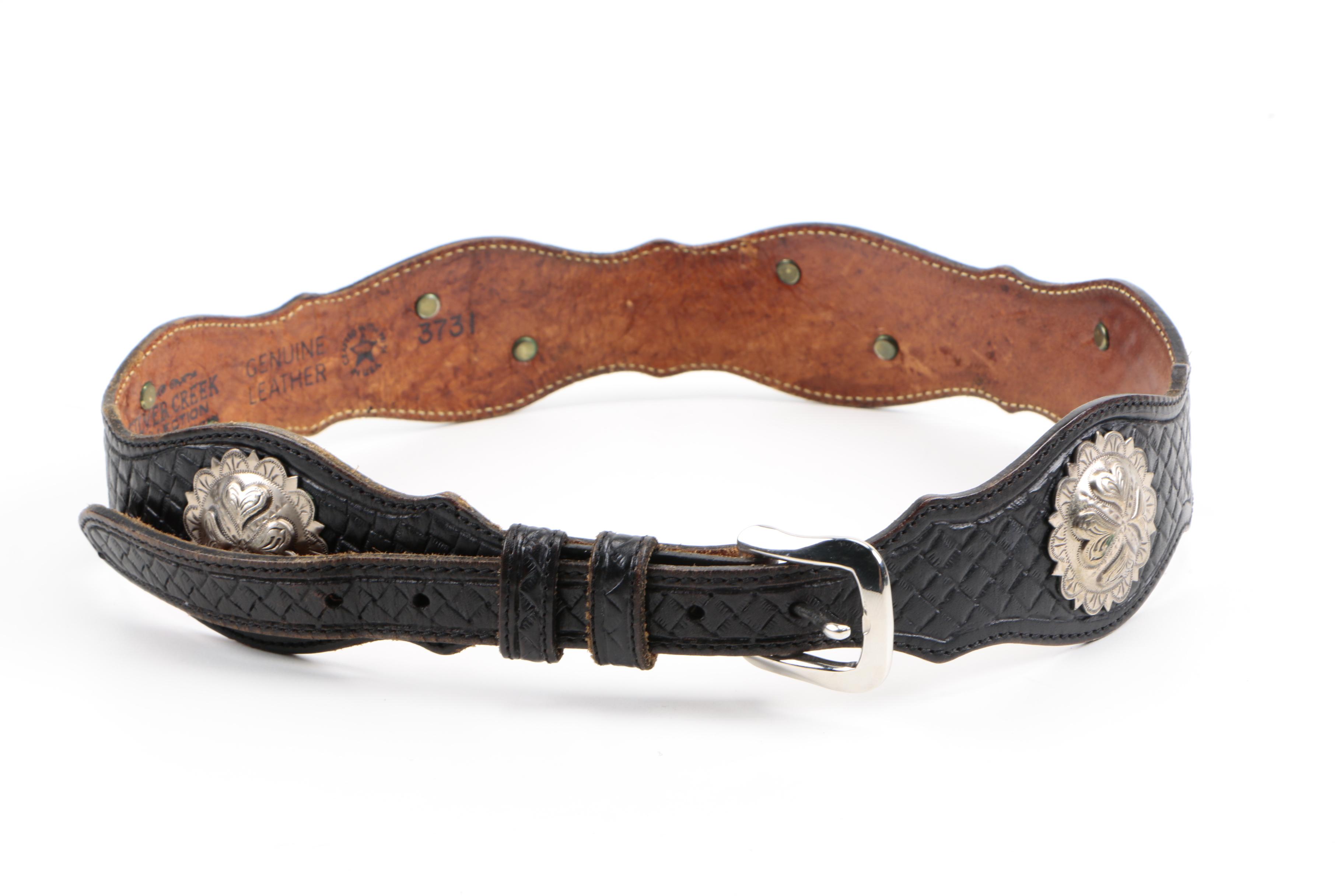 Leather Belts Including an Yves Saint Laurent Belt Buckle