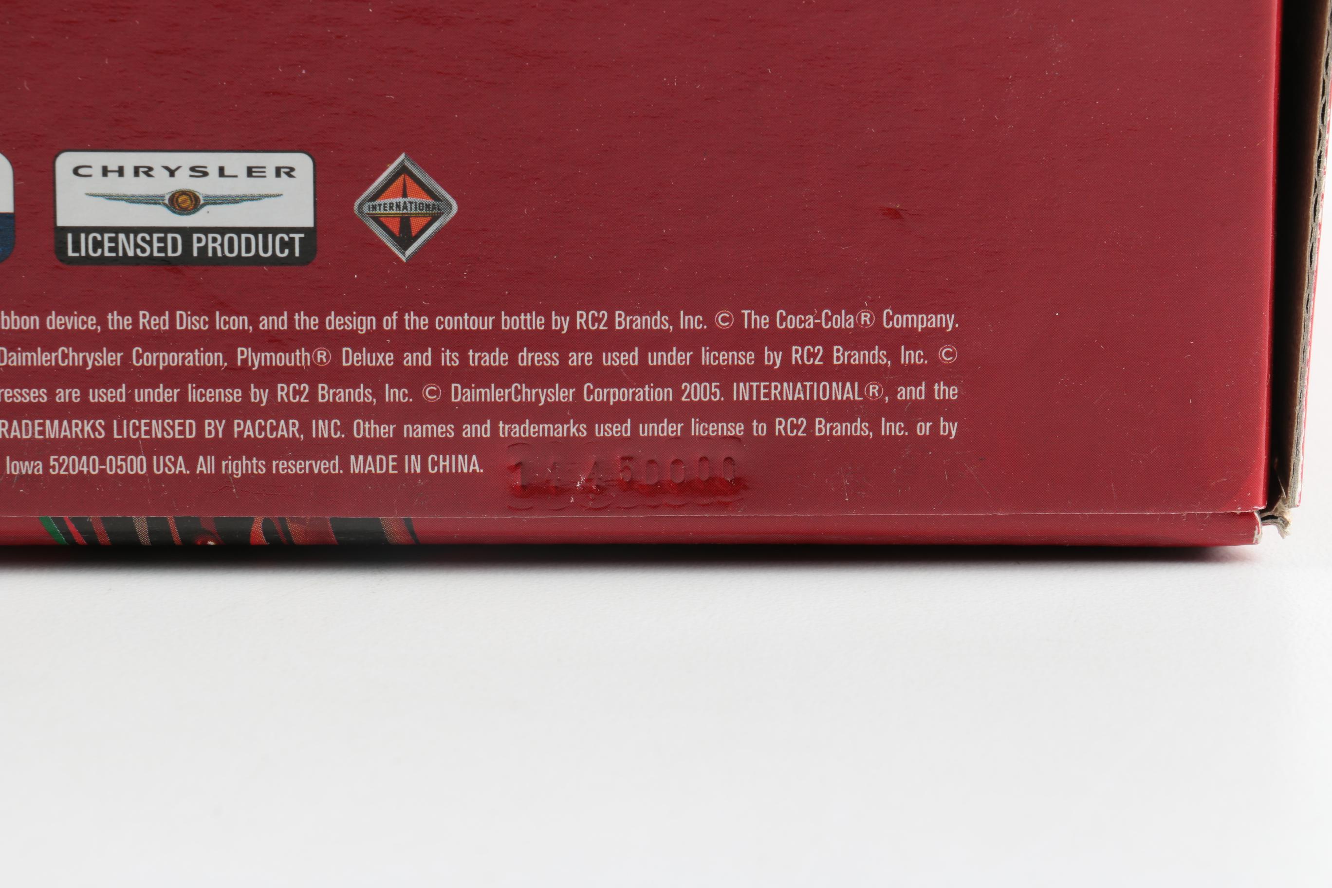 Die-Cast Replica Delivery Vehicles Featuring Coca-Cola