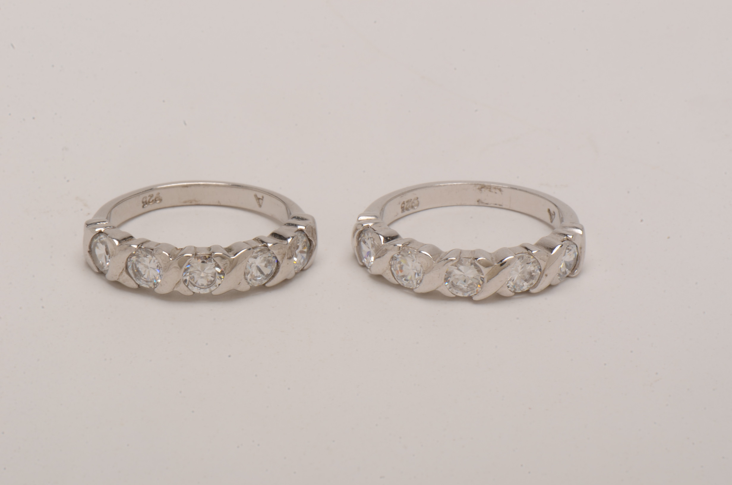 Three Sterling Silver Rings With Cubic Zirconia