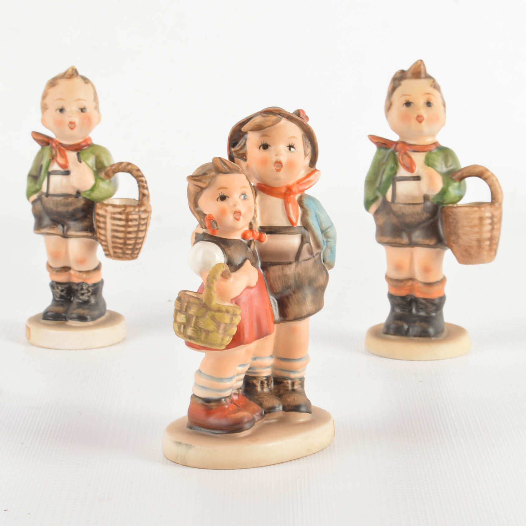 Three M.J. Hummel Figurines