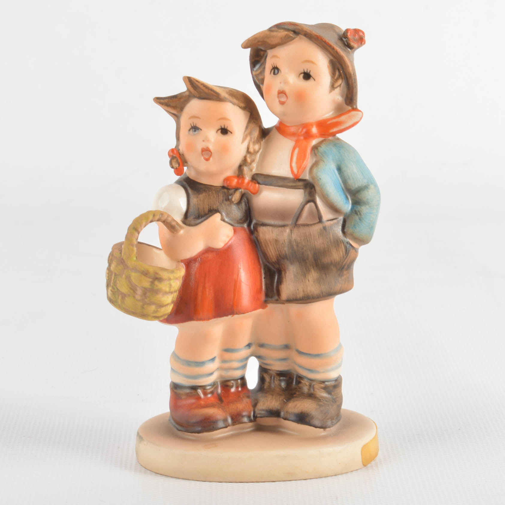Three M.J. Hummel Figurines