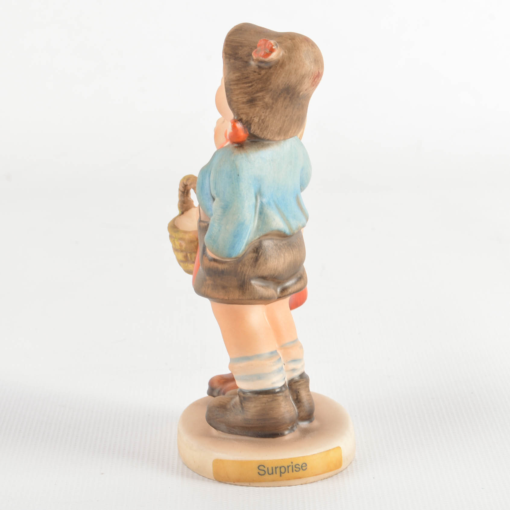 Three M.J. Hummel Figurines