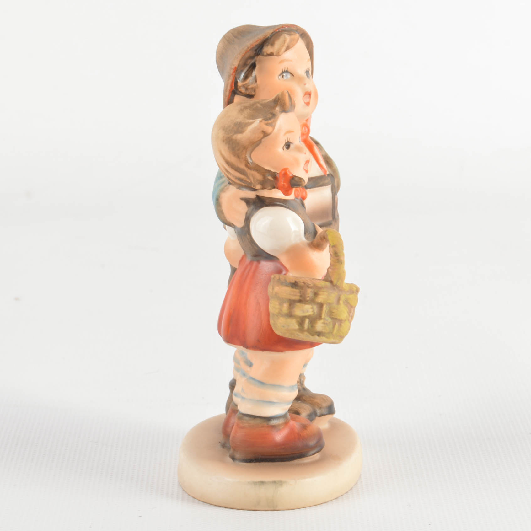 Three M.J. Hummel Figurines