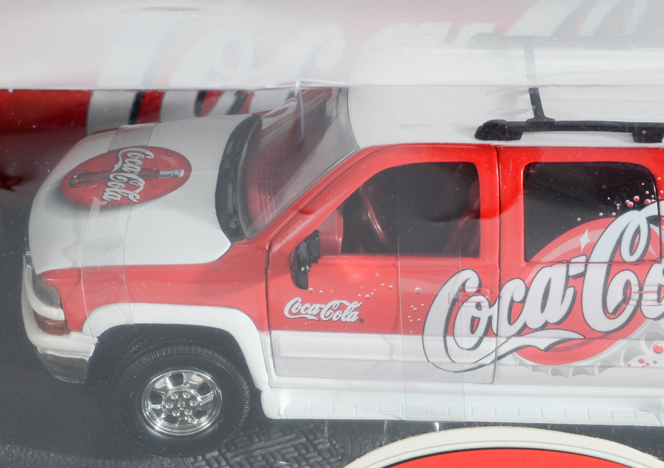 Four Coca-Cola Matchbox/Johnny Lightning Cars