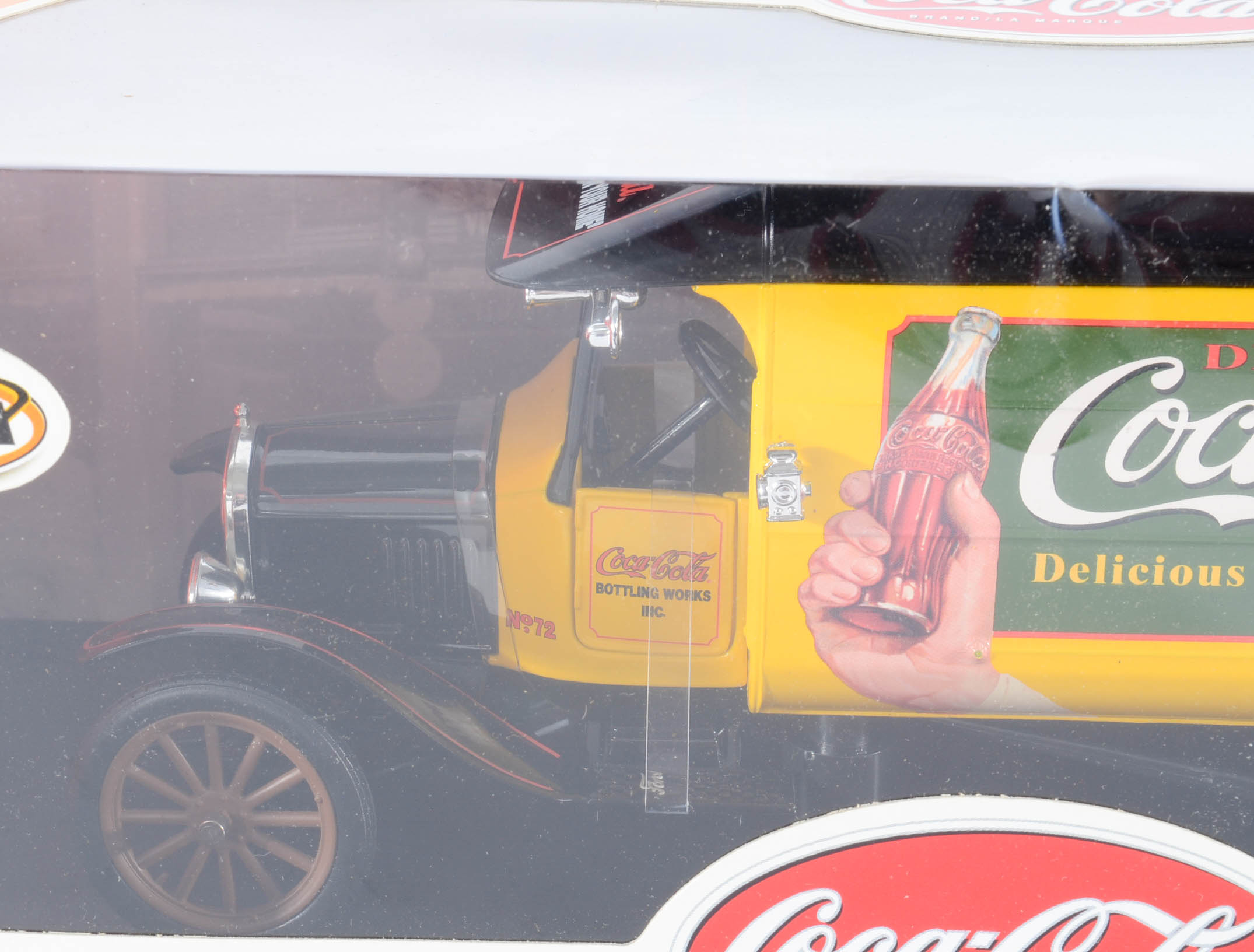 Four Coca-Cola Matchbox/Johnny Lightning Cars