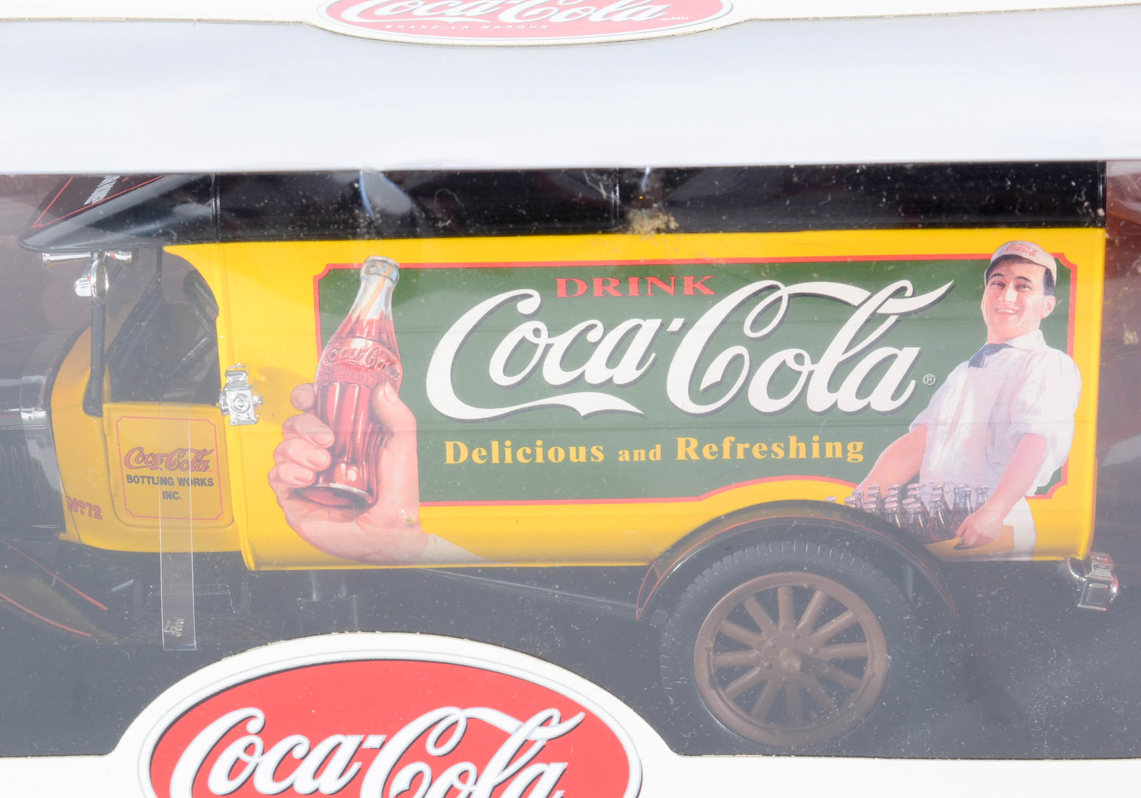 Four Coca-Cola Matchbox/Johnny Lightning Cars