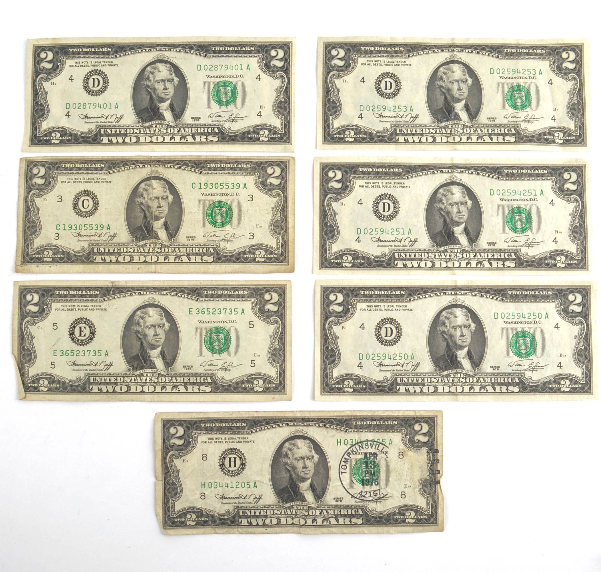Seven 1976 United States $2 Federal Reserve Notes