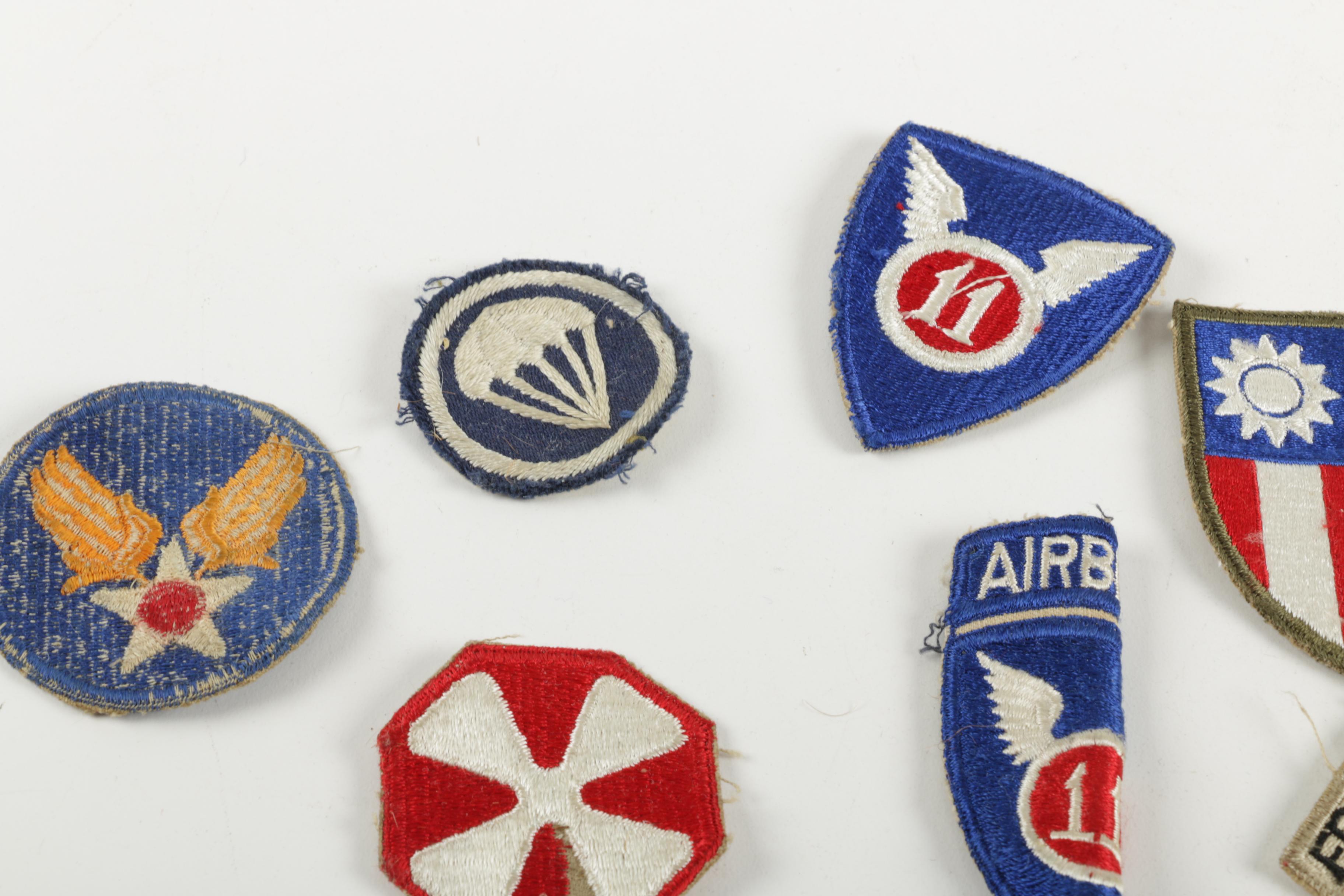 Assortment of Military Patches and Pins