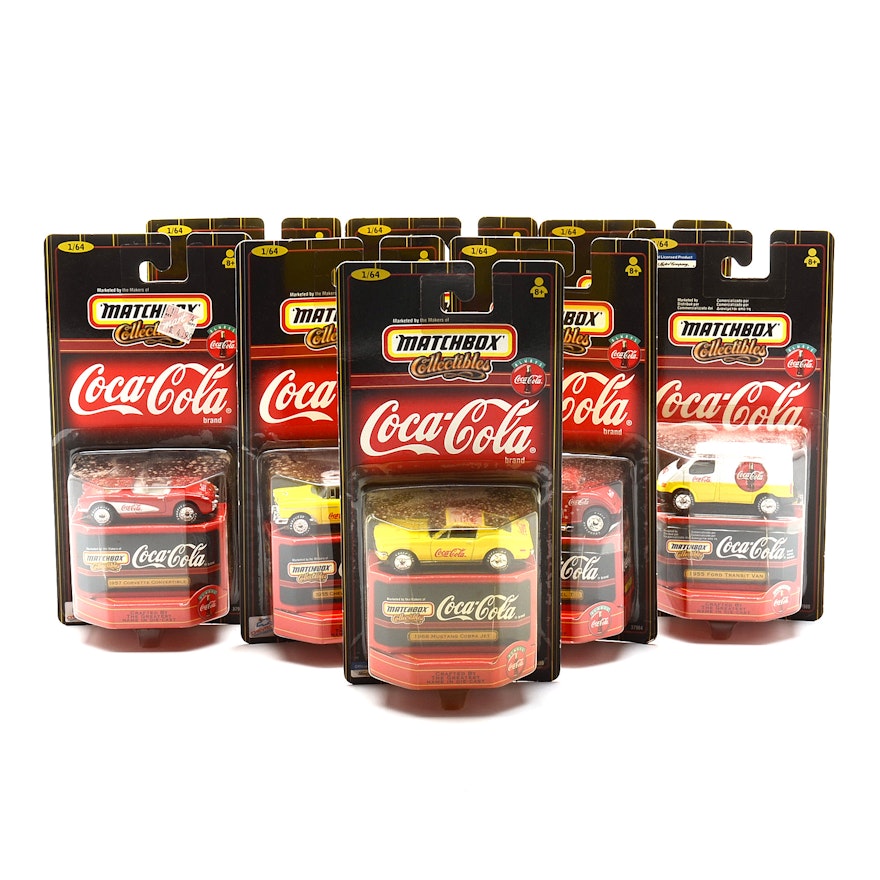 Eight Coca-Cola Matchbox Cars in Box