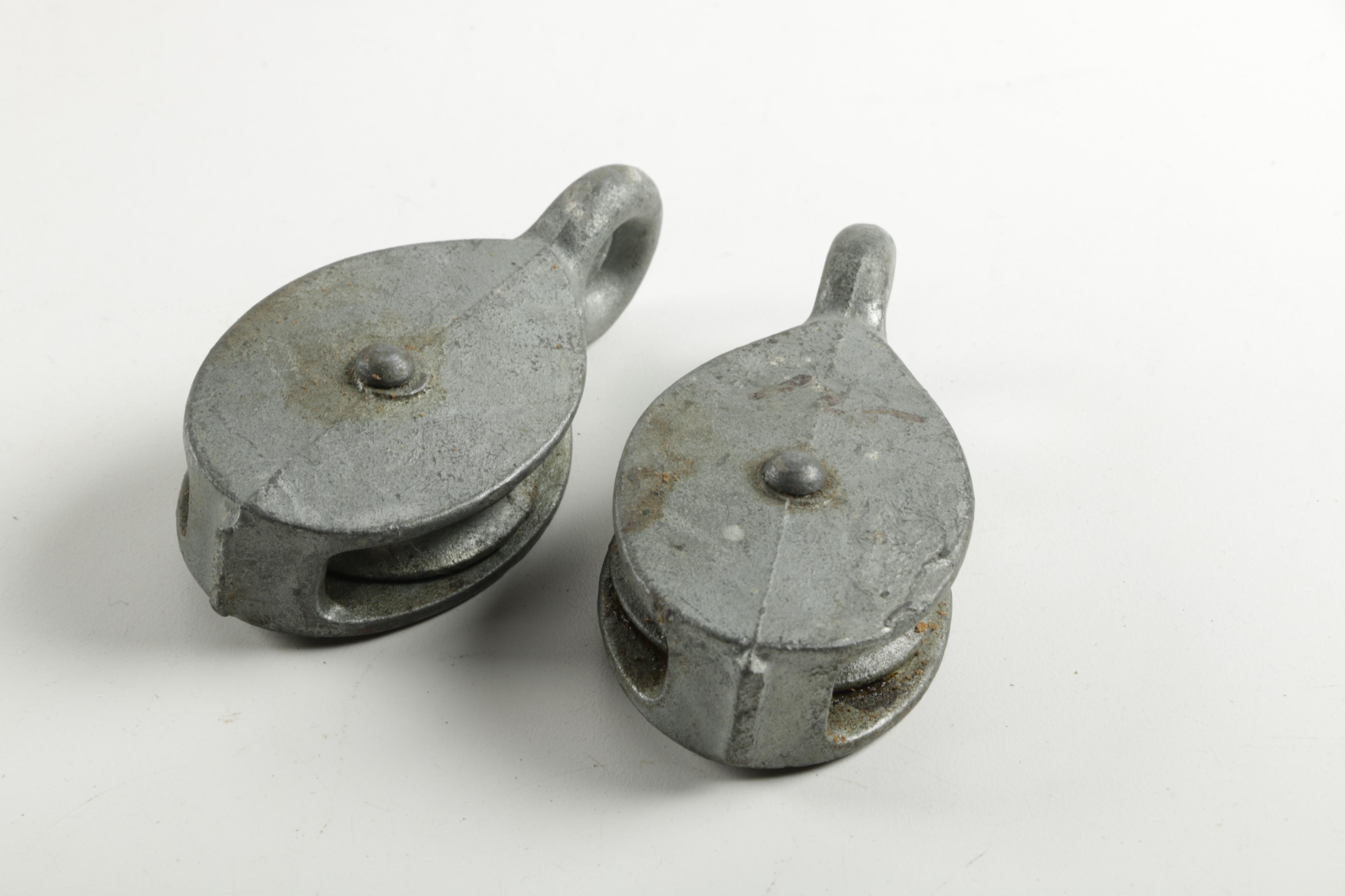 Three fixed pulleys