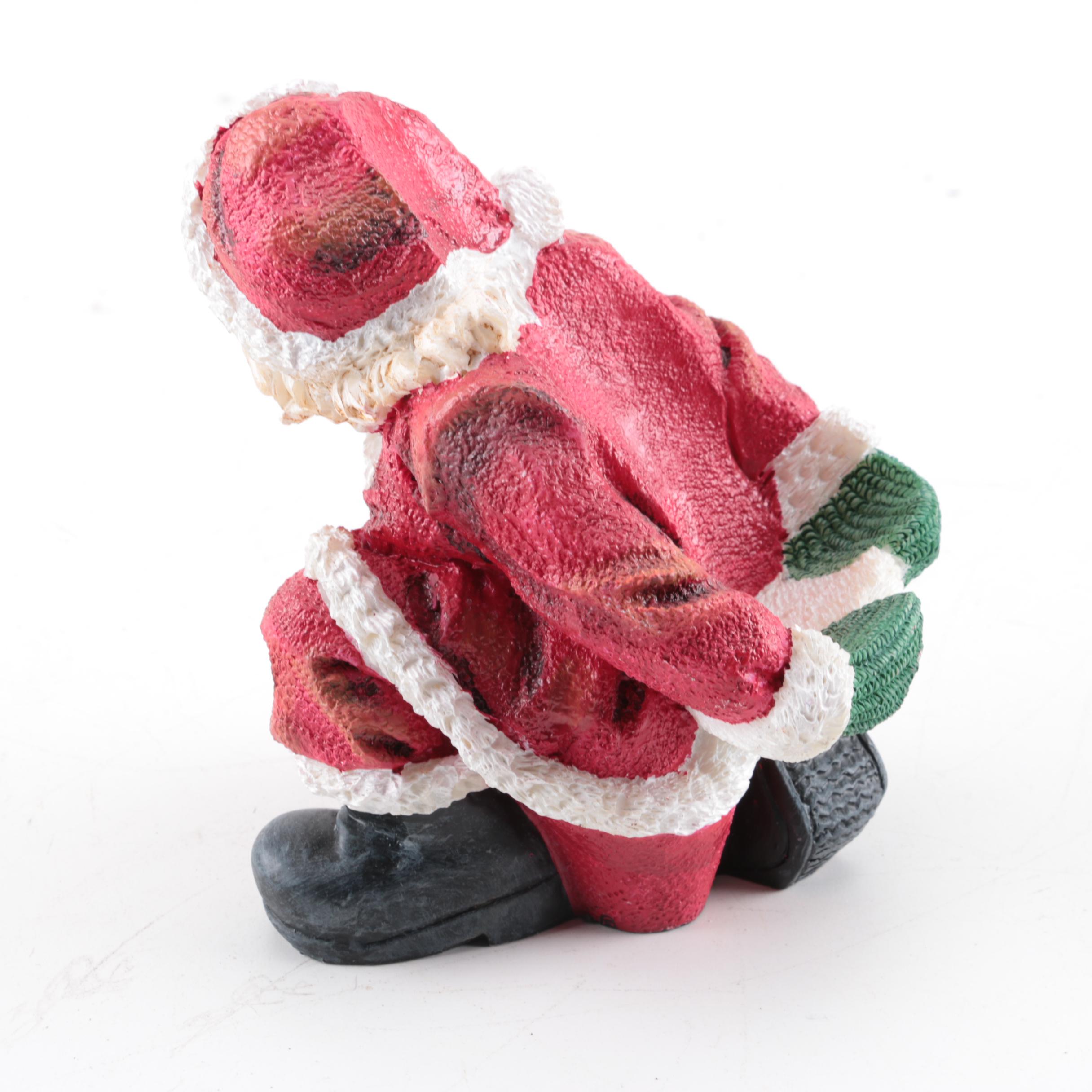 Santa Figurines and Statuettes