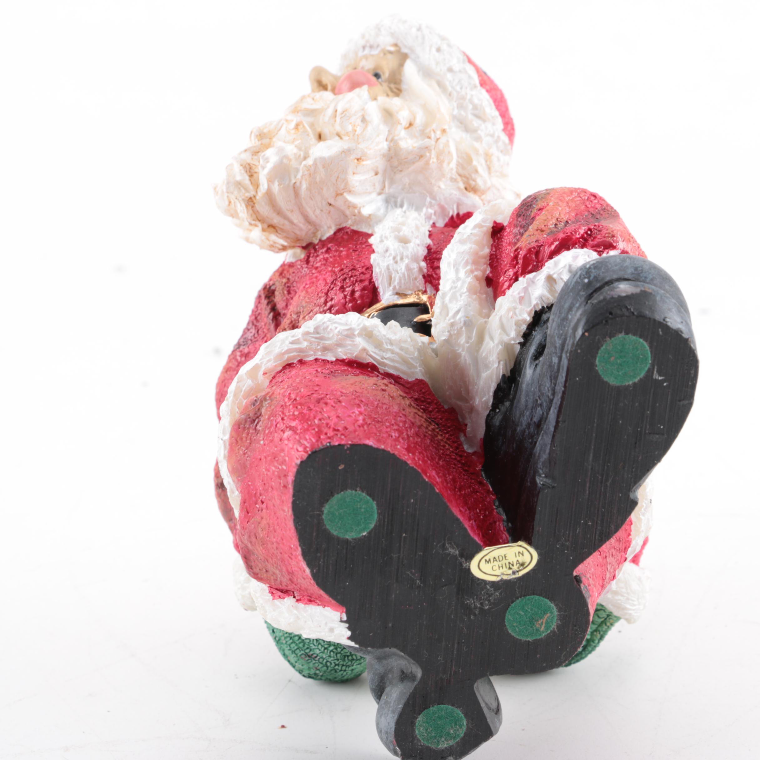 Santa Figurines and Statuettes