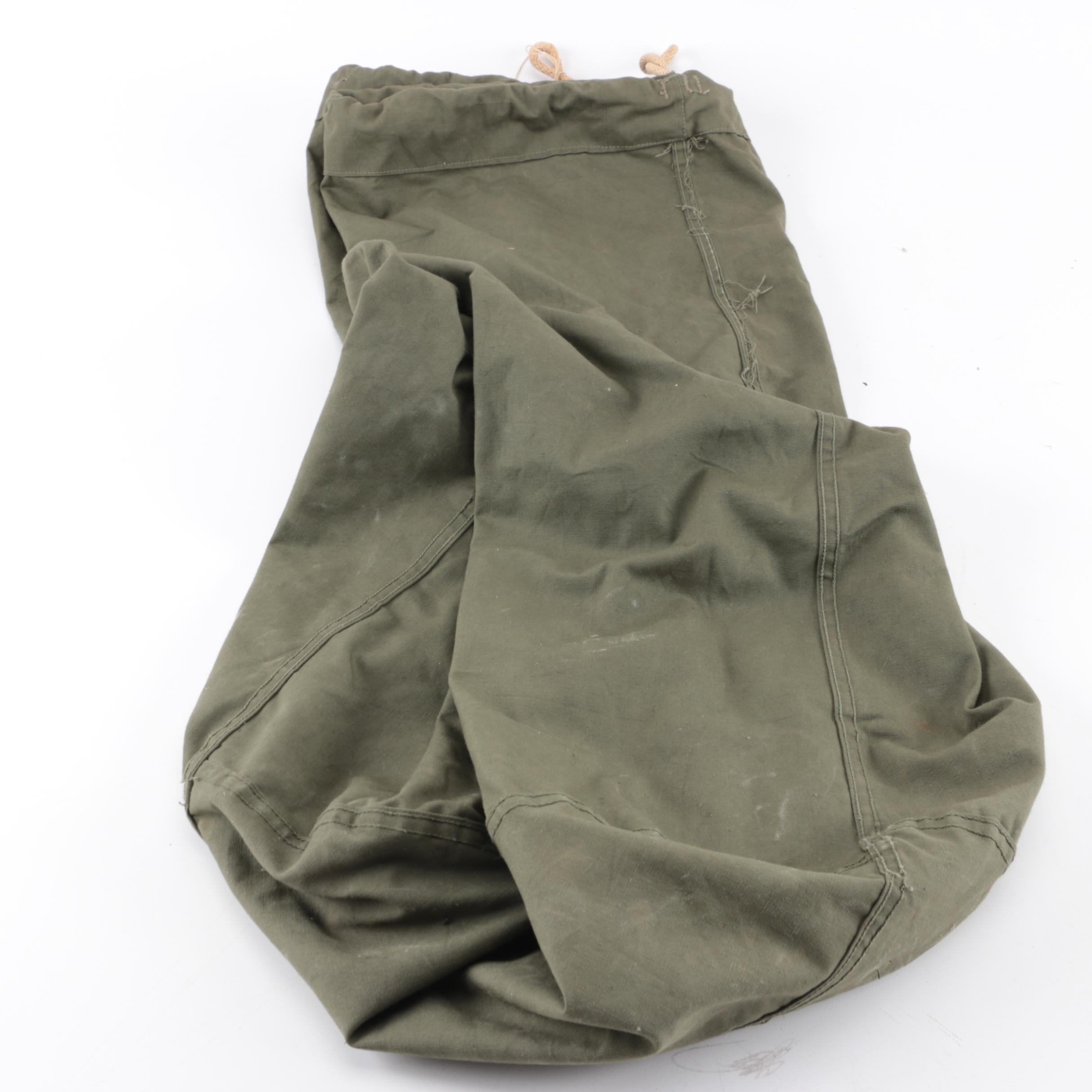 Collection of Military Canteens, Pouches, and Gear