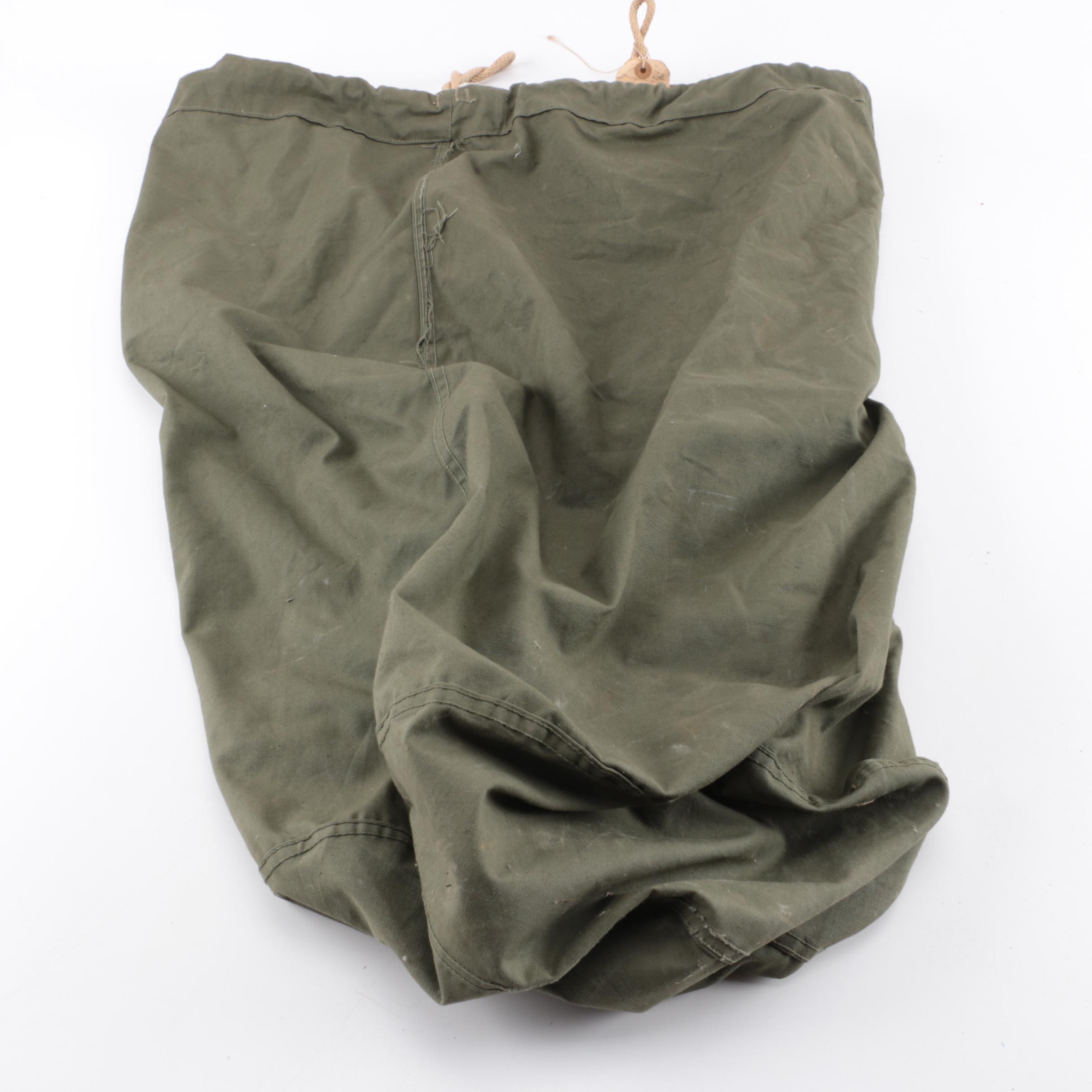 Collection of Military Canteens, Pouches, and Gear