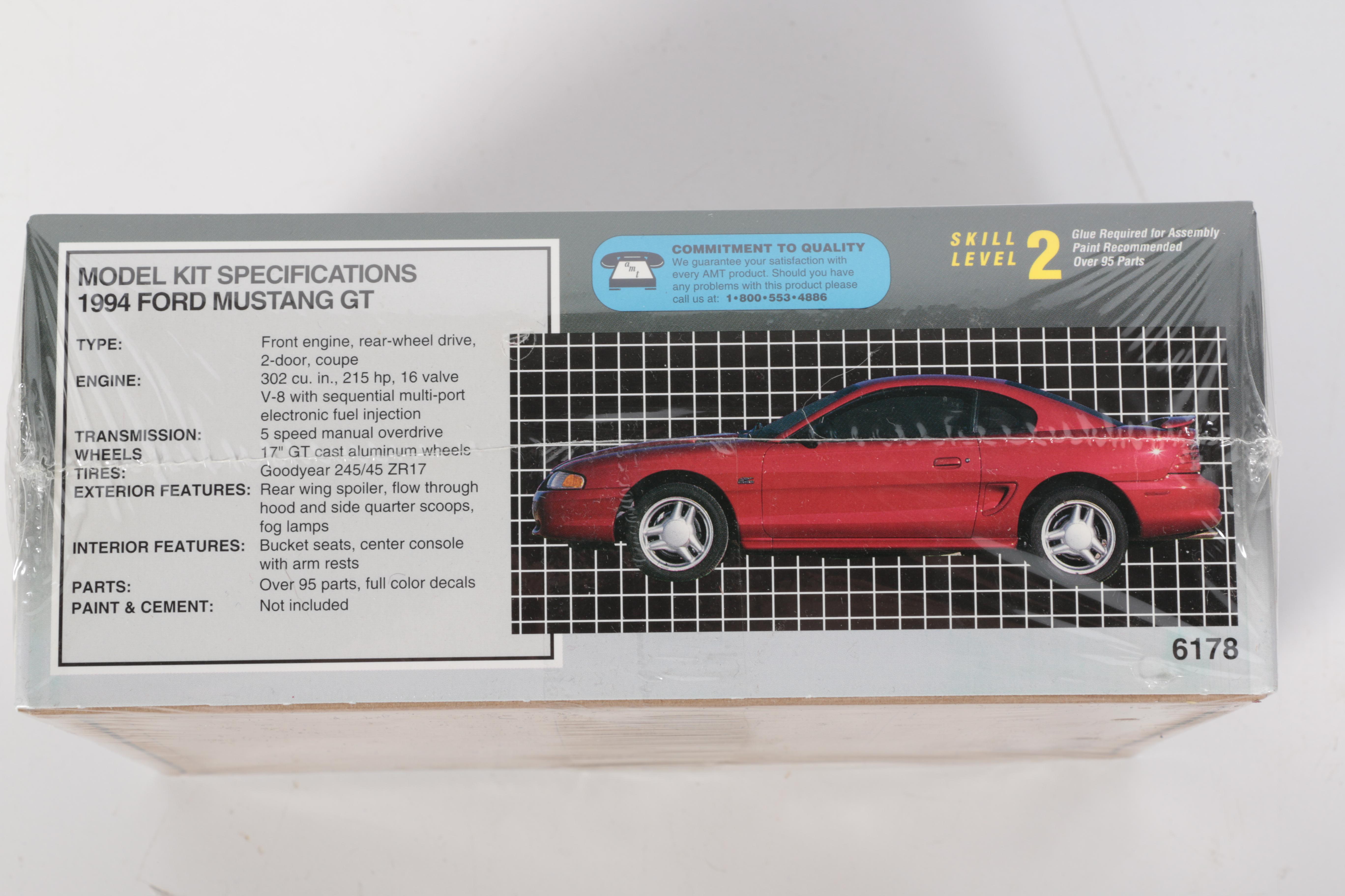 Collection of Model Car Kits and an Ertl Promo Car