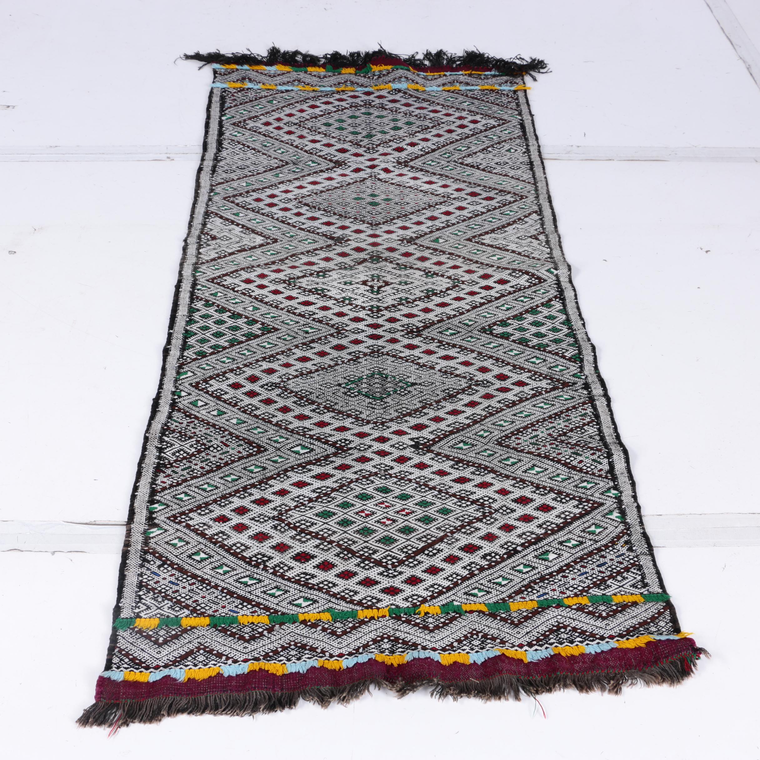 Handwoven and Embroidered Moroccan Area Rug and Throw Pillow