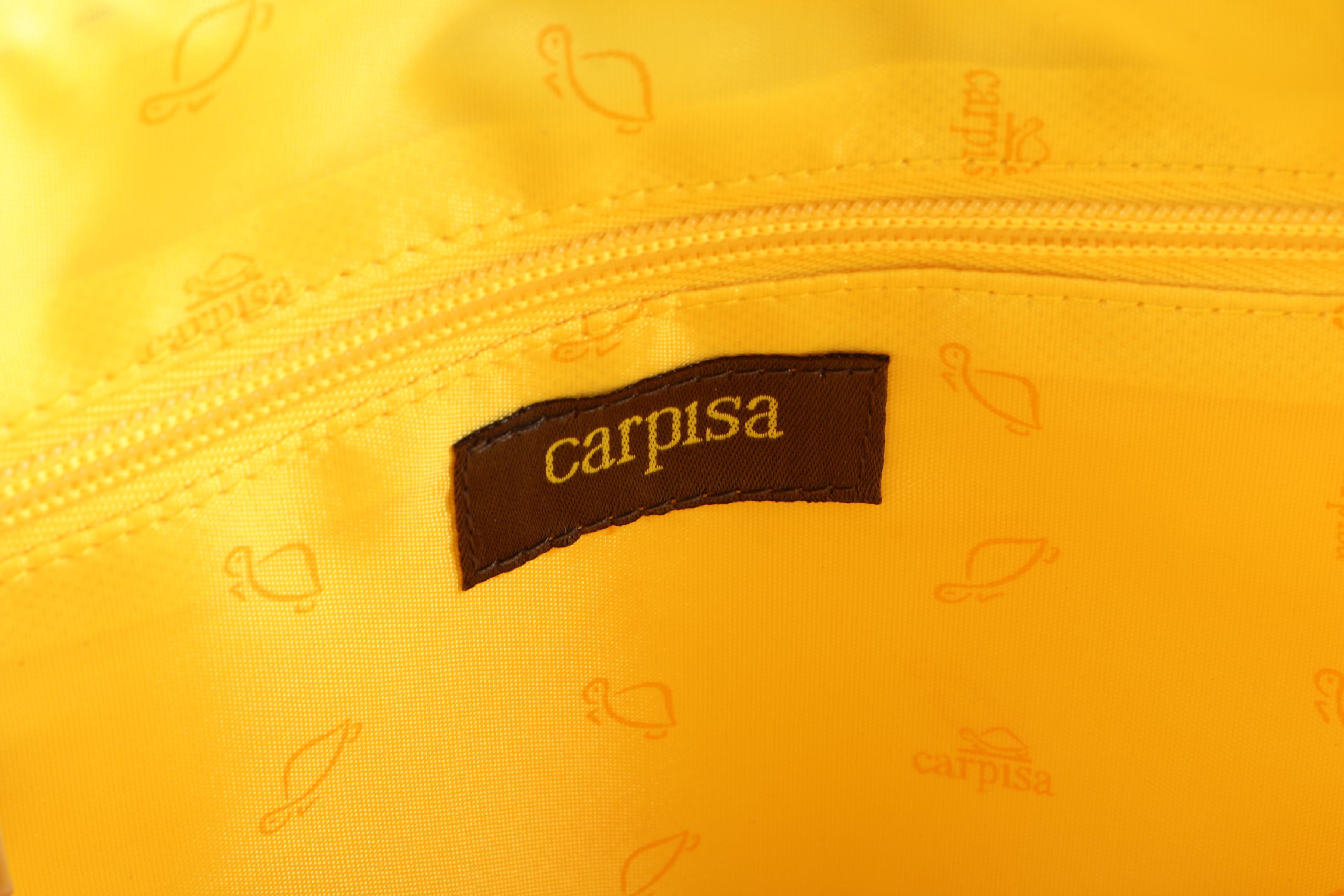 Fossil Duffle Bag and Carpisa Backpack