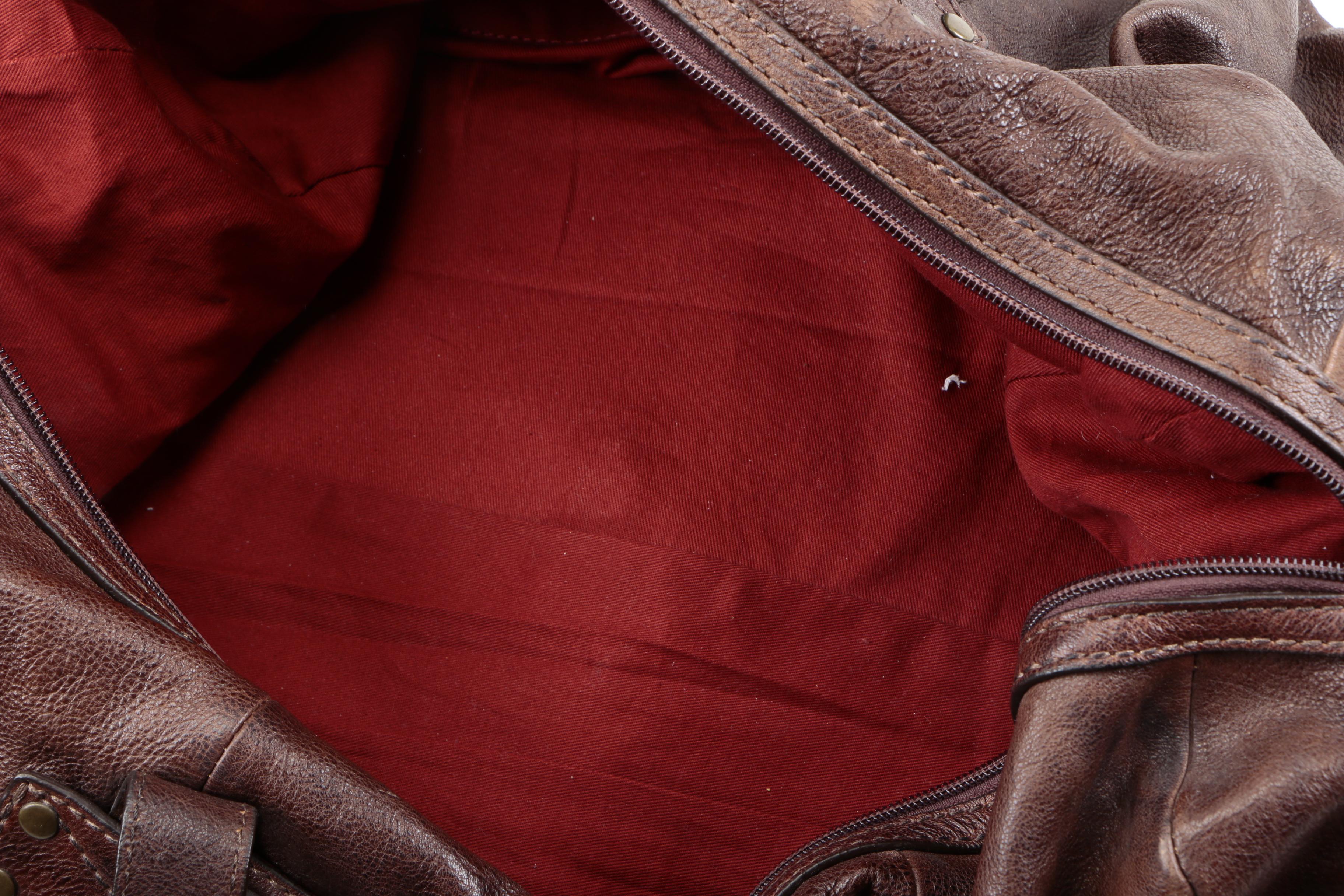 Fossil Duffle Bag and Carpisa Backpack