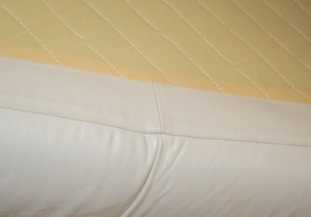 Cream Colored Leather Sofa