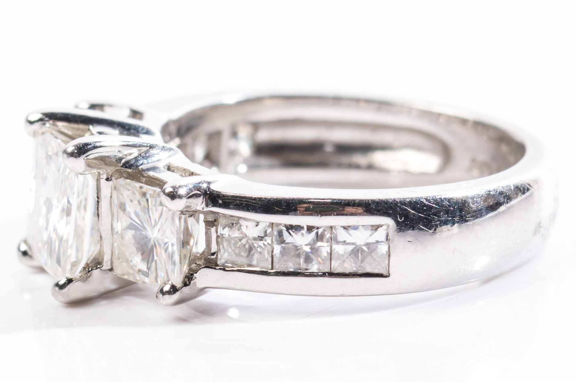 Platinum Three-Stone Moissanite Ring and Eternity Band