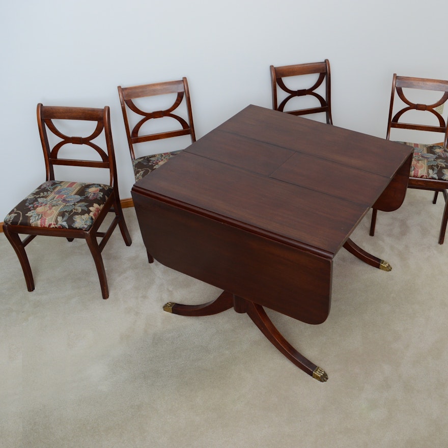 Walnut Duncan Phyfe Style Drop Leaf Table and Four Chairs