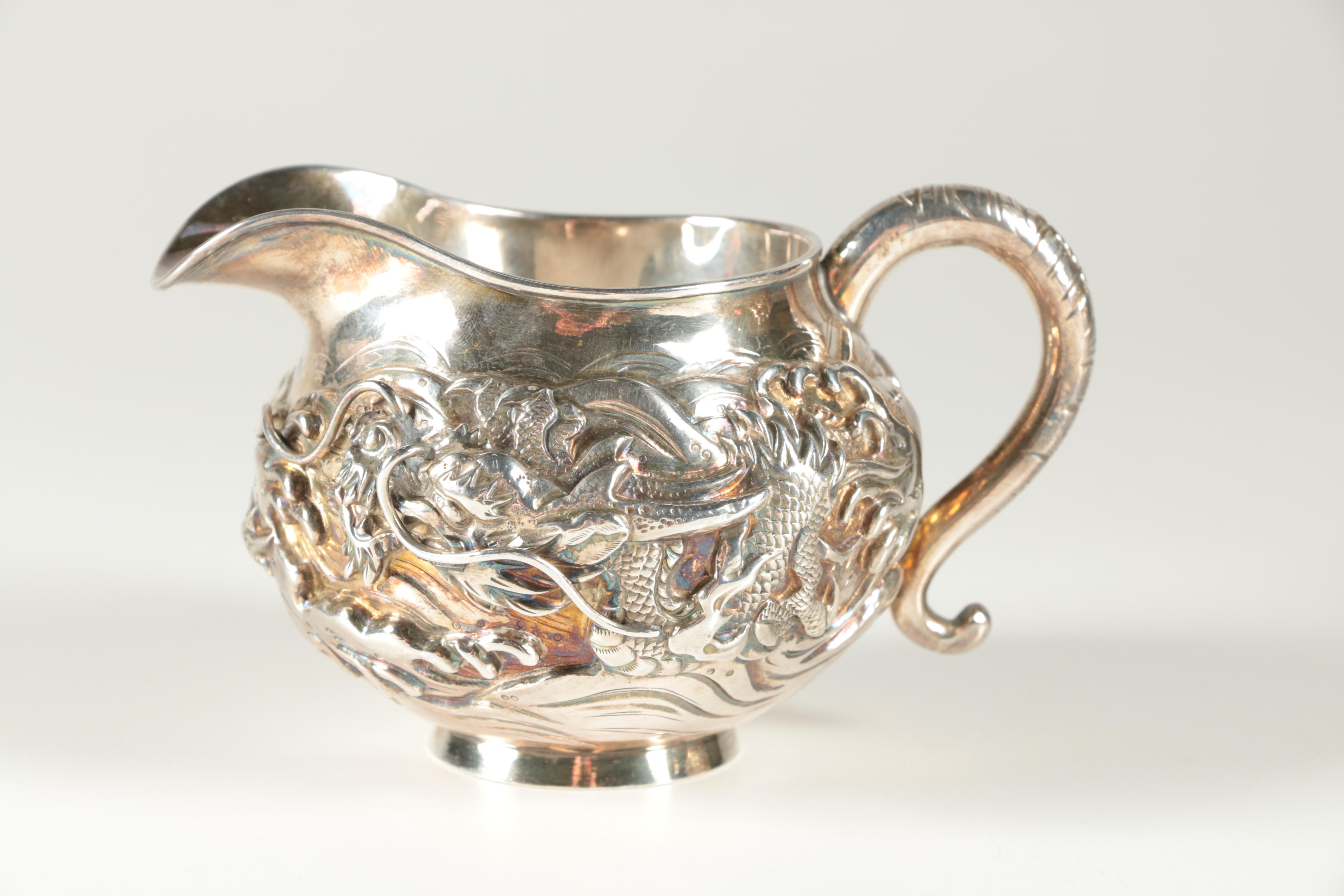 Ornate Japanese Watanabe Sterling Silver Tea Set with Water Dragon Motif