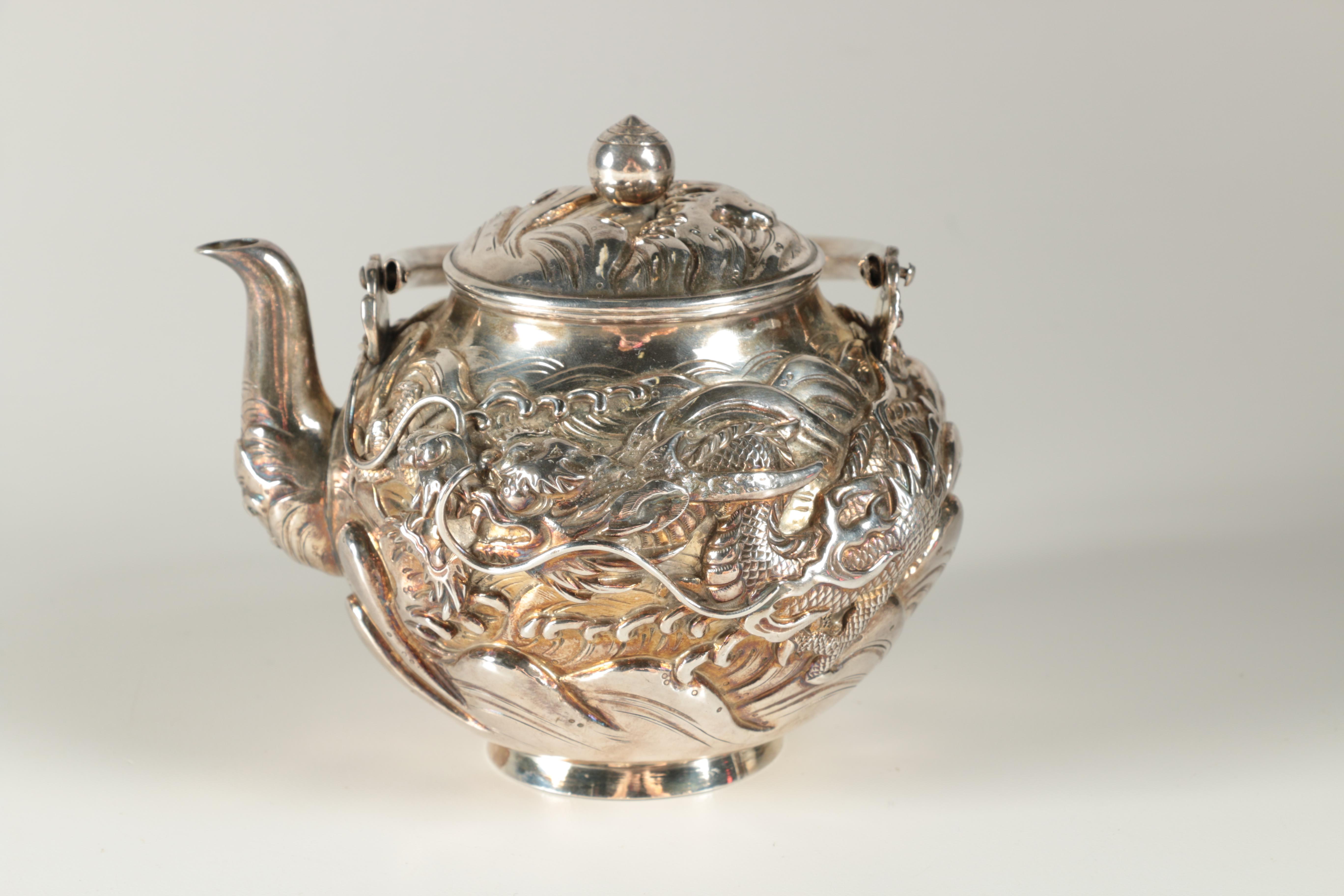 Ornate Japanese Watanabe Sterling Silver Tea Set with Water Dragon Motif