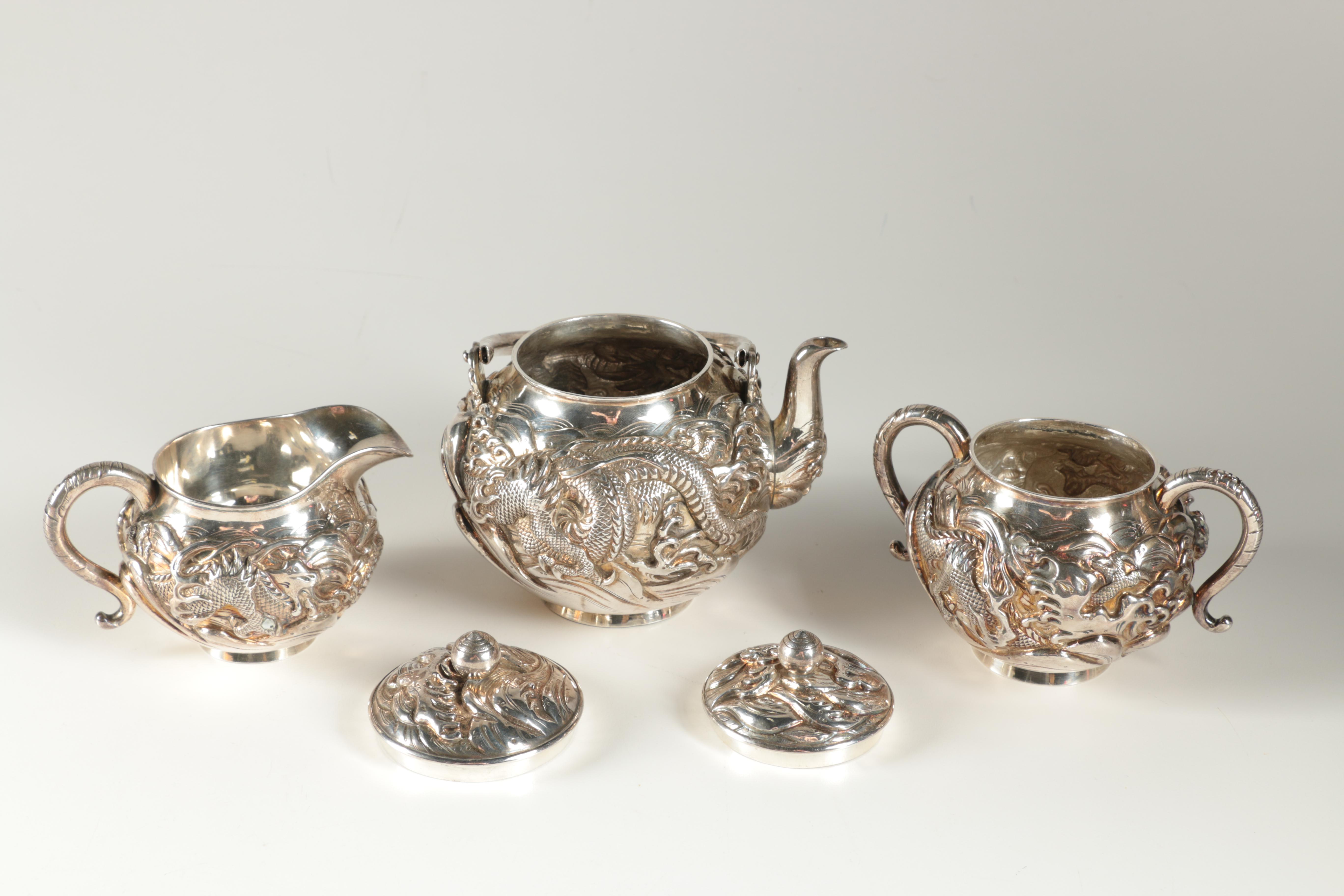Ornate Japanese Watanabe Sterling Silver Tea Set with Water Dragon Motif
