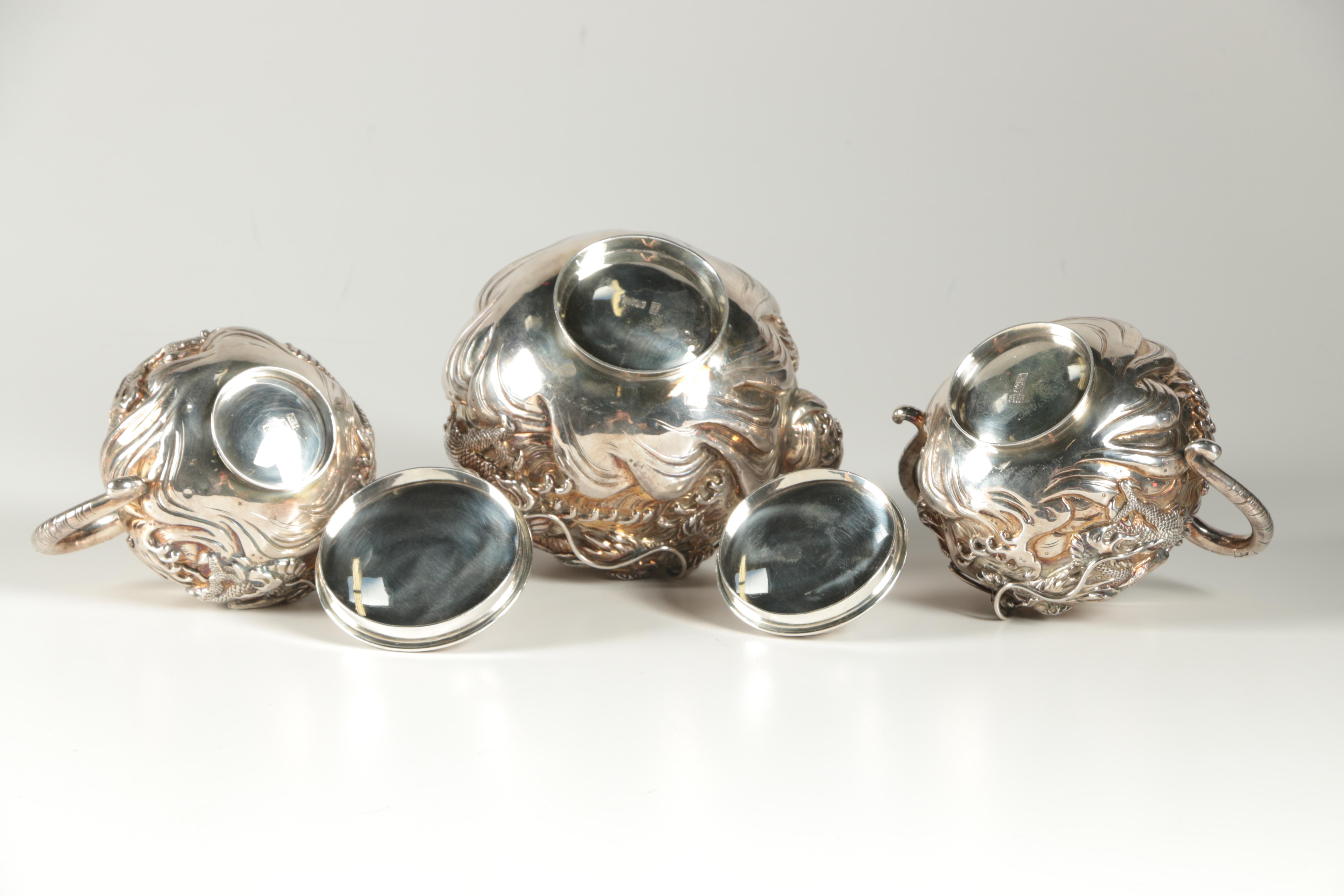 Ornate Japanese Watanabe Sterling Silver Tea Set with Water Dragon Motif