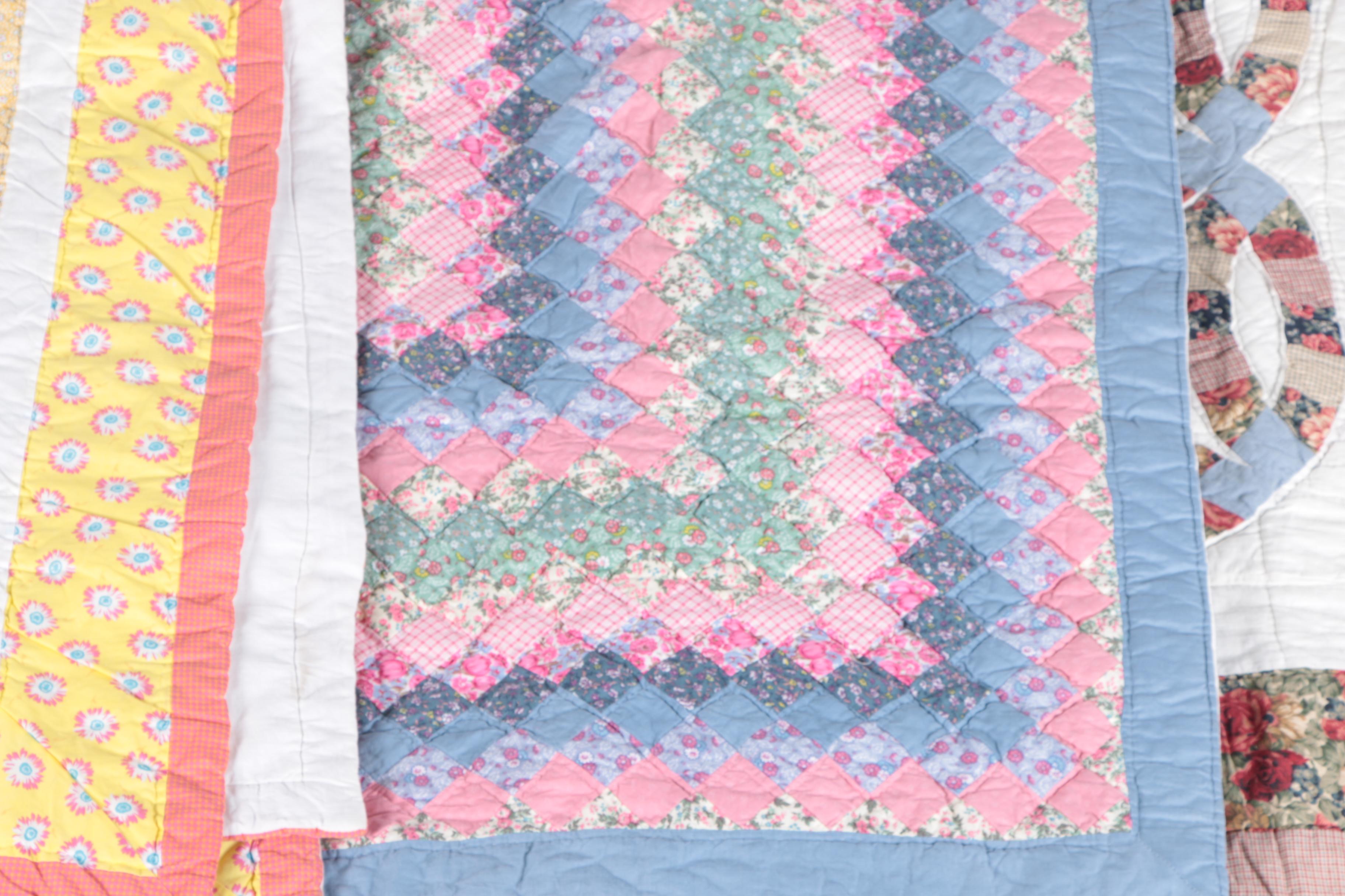 Hand Picked Quilts in "Spool", "Trip Around the World" and "Wedding Ring"