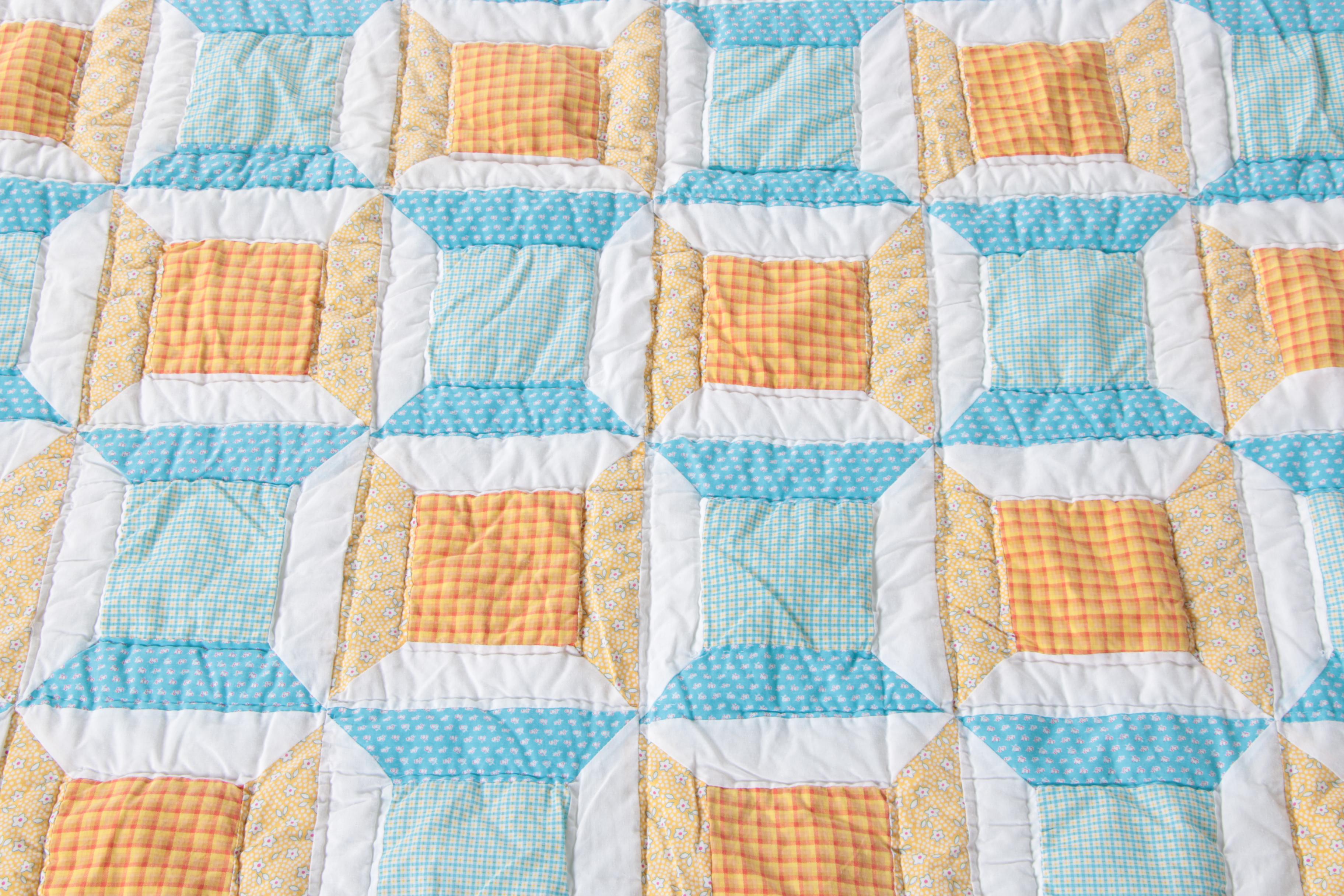 Hand Picked Quilts in "Spool", "Trip Around the World" and "Wedding Ring"