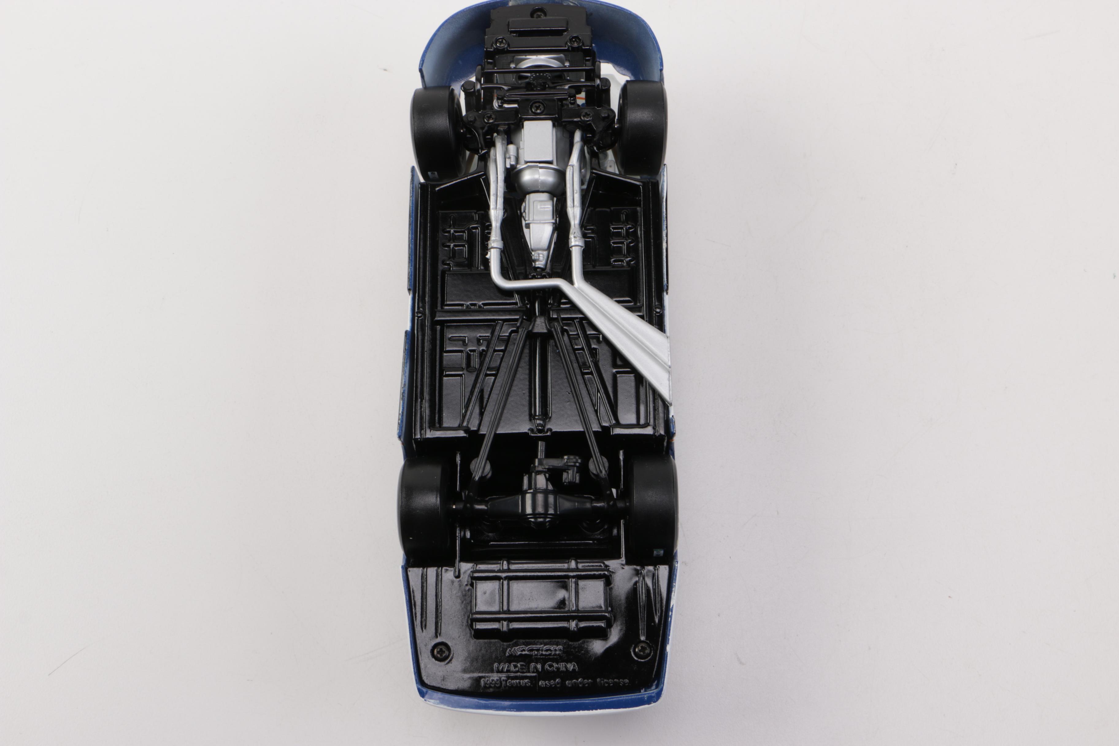 NASCAR Ford Taurus Die-Cast Stock Car and Dale Earnhardt Action Figure