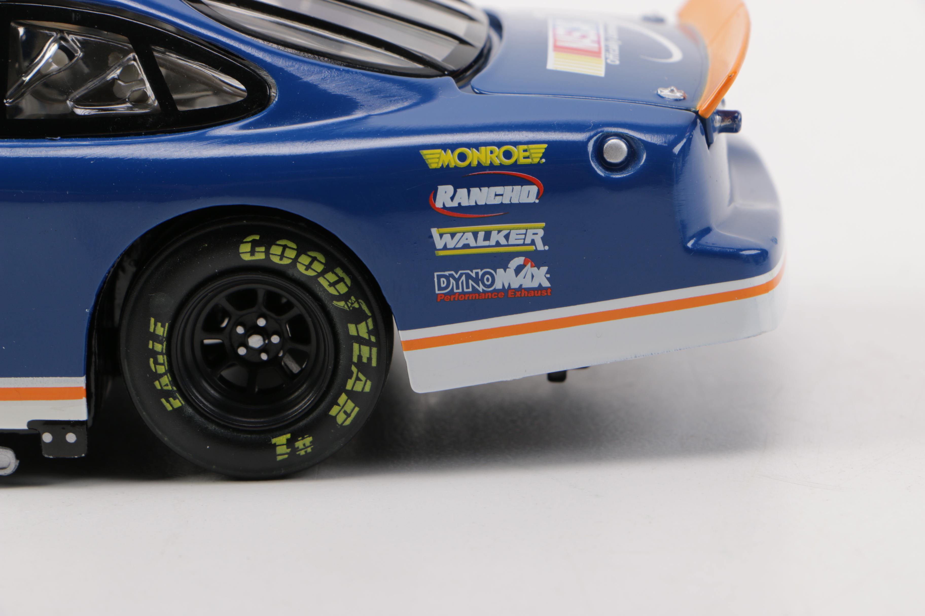 NASCAR Ford Taurus Die-Cast Stock Car and Dale Earnhardt Action Figure